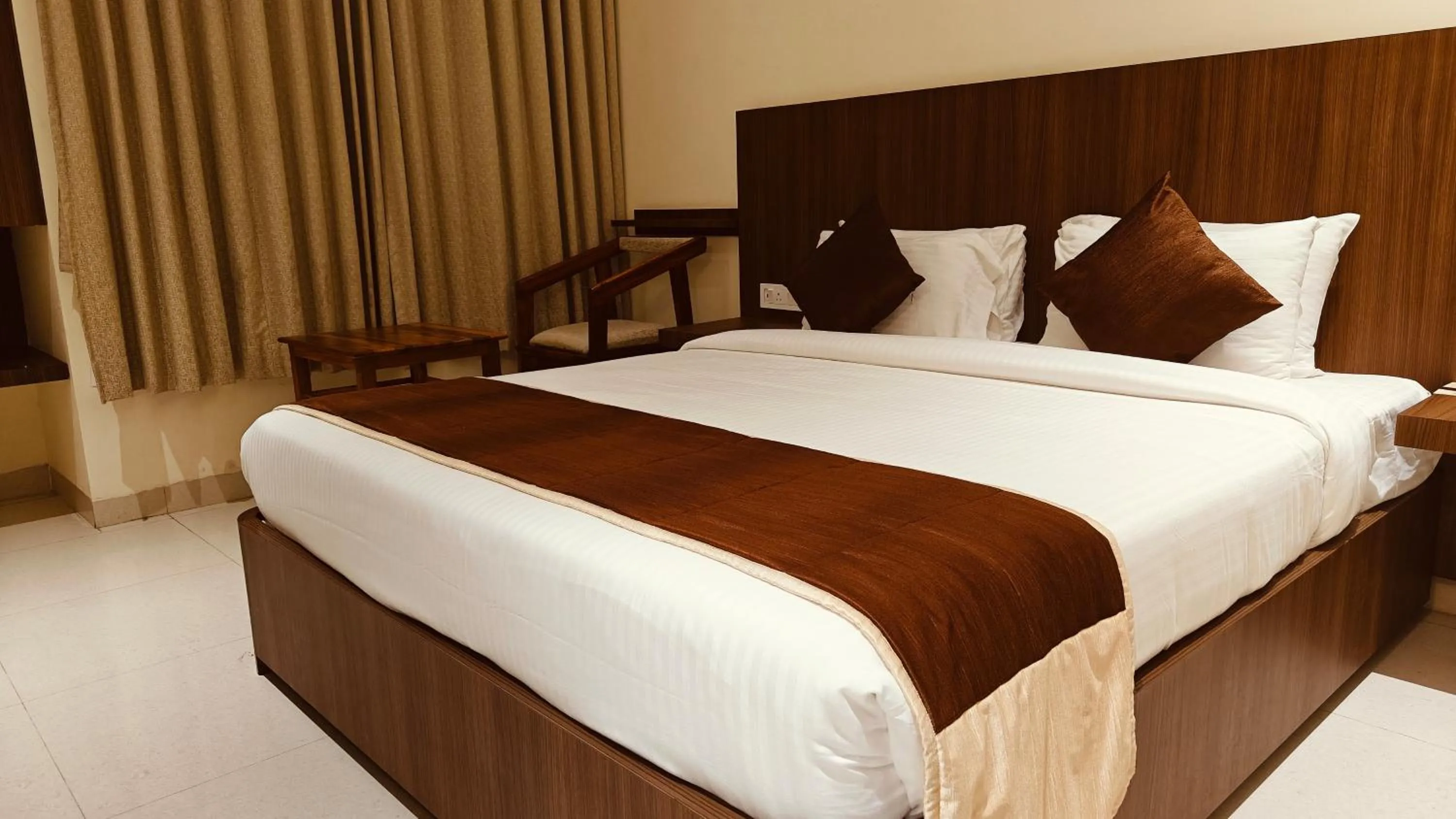 Bed in Alps Residency - A Bergamont Hotel, Krishnagiri