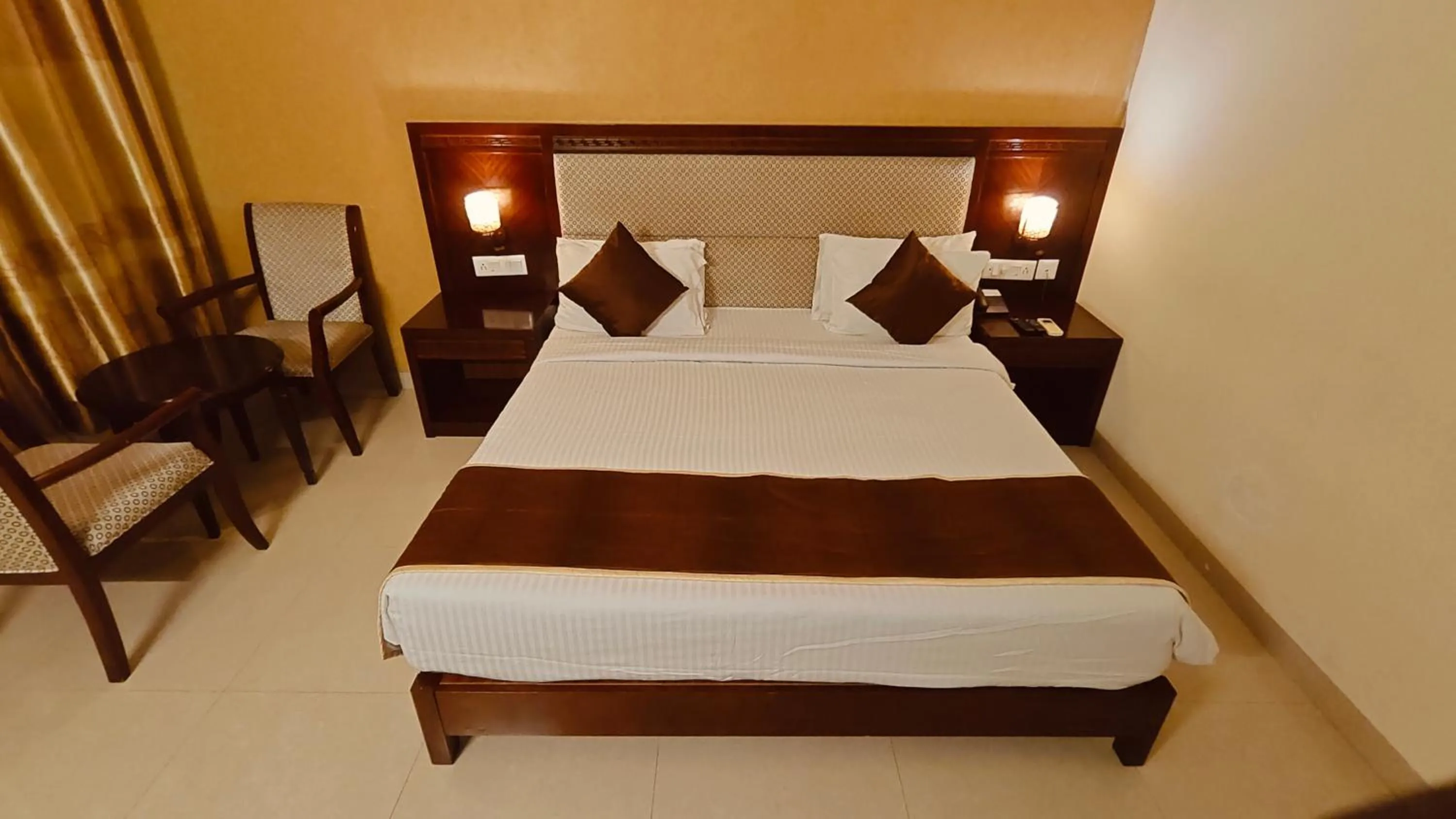Bed in Alps Residency - A Bergamont Hotel, Krishnagiri