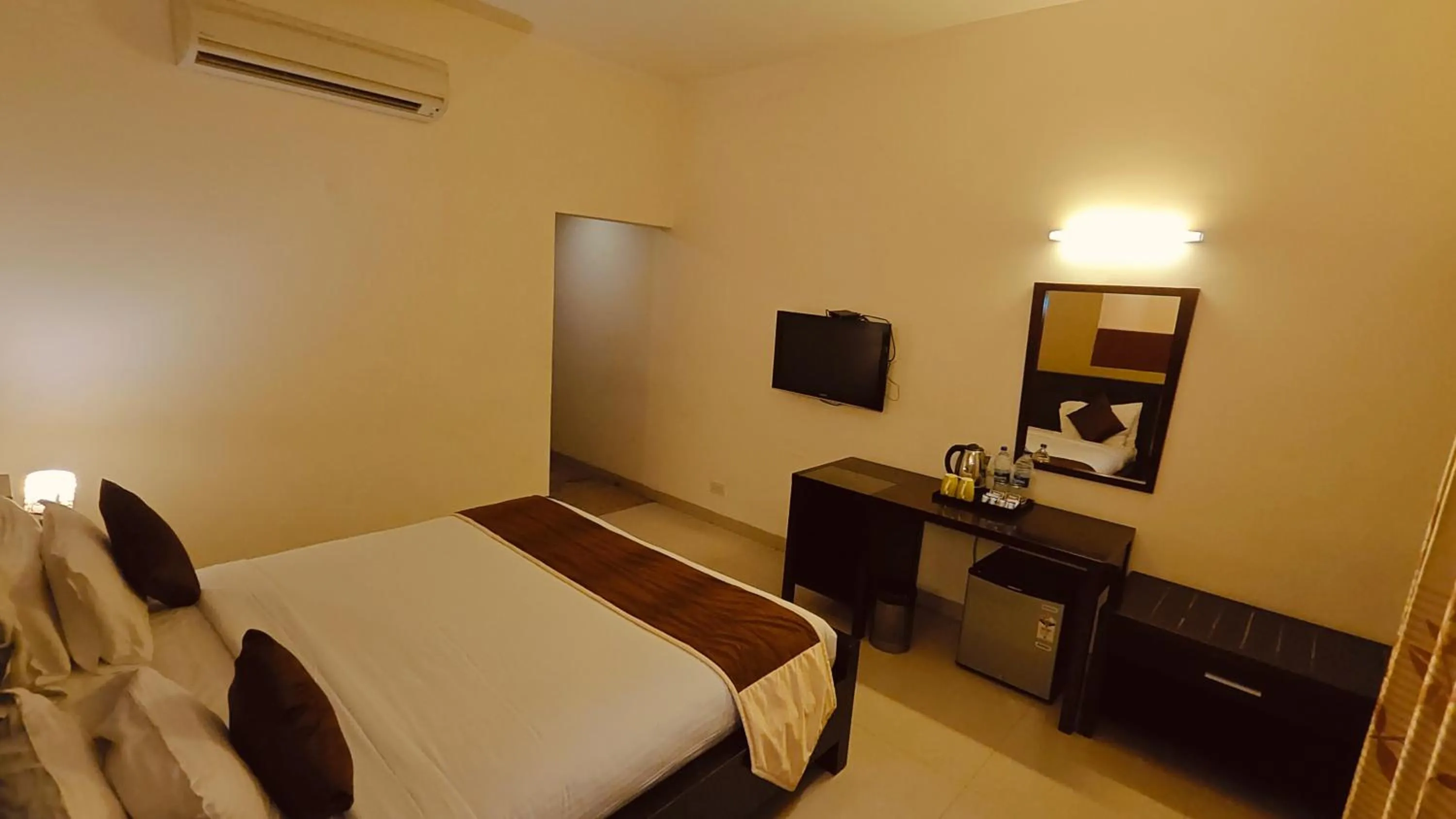 Bed in Alps Residency - A Bergamont Hotel, Krishnagiri