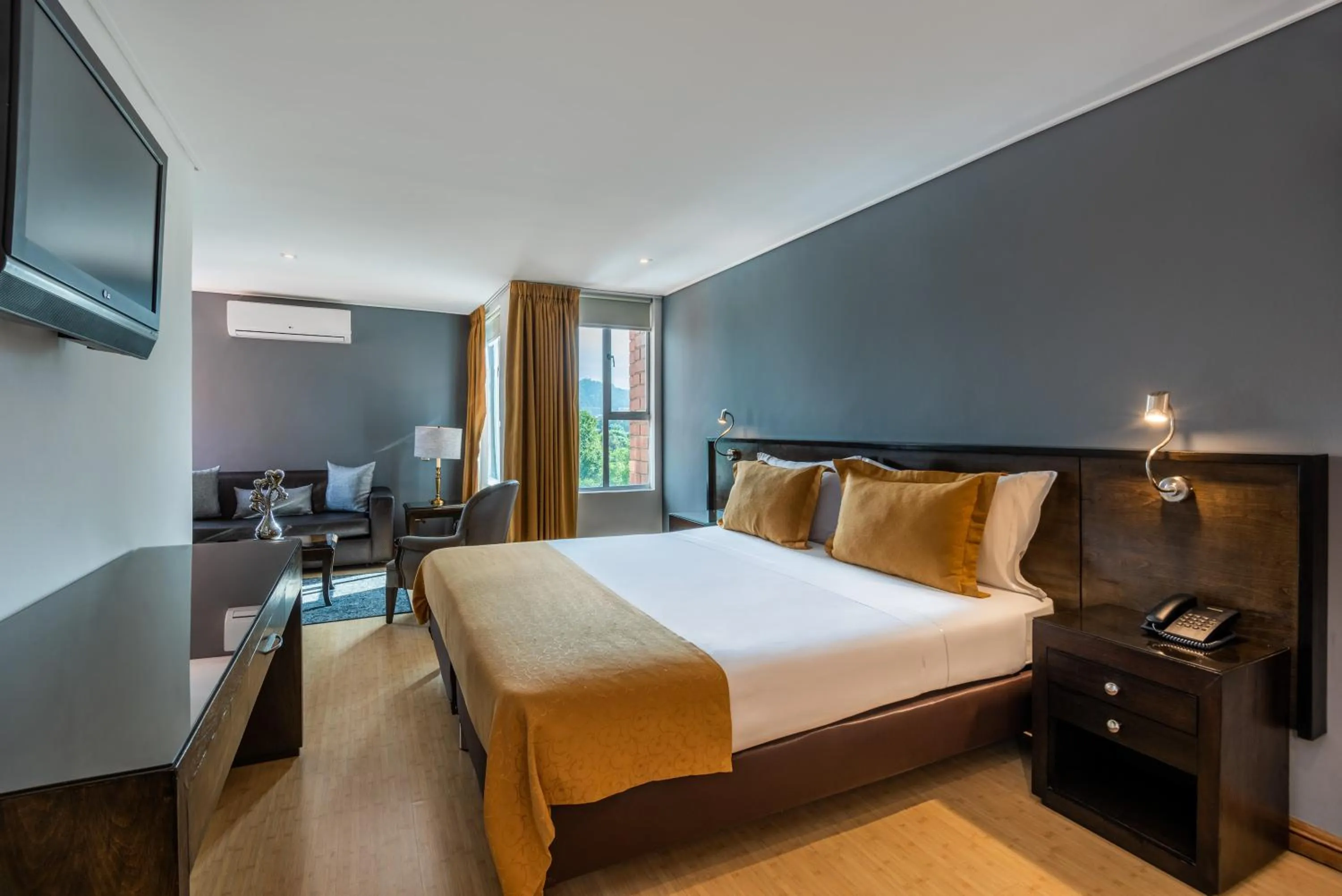 Photo of the whole room, Bed in Hotel Egina Medellin