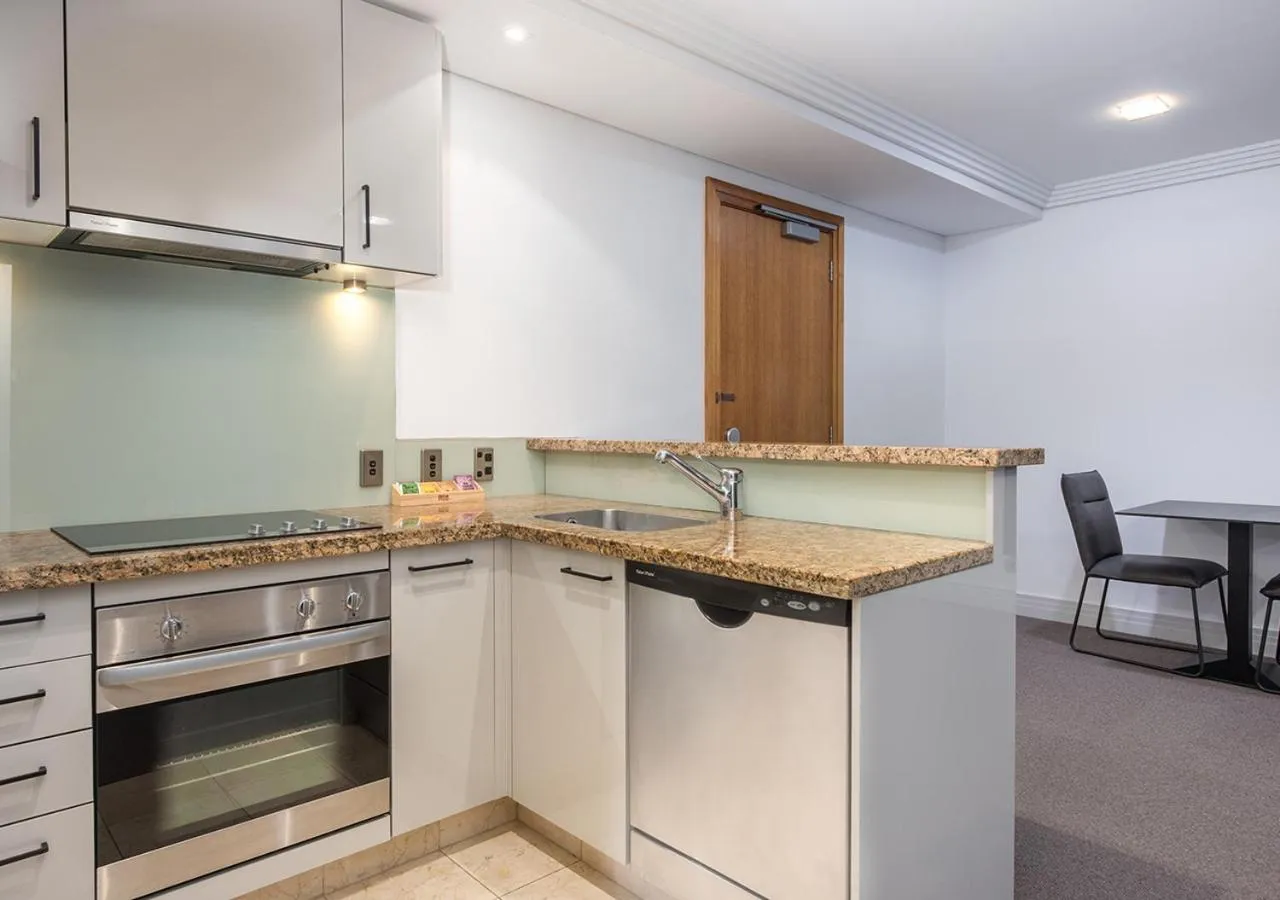 Kitchen or kitchenette in Avani Metropolis Auckland Residences