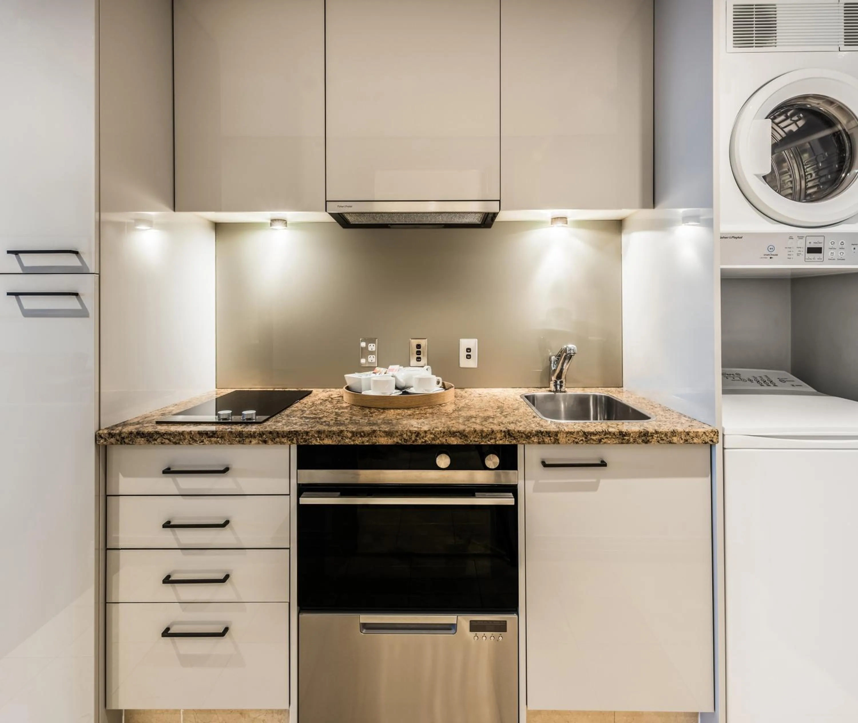 Kitchen or kitchenette in Avani Metropolis Auckland Residences