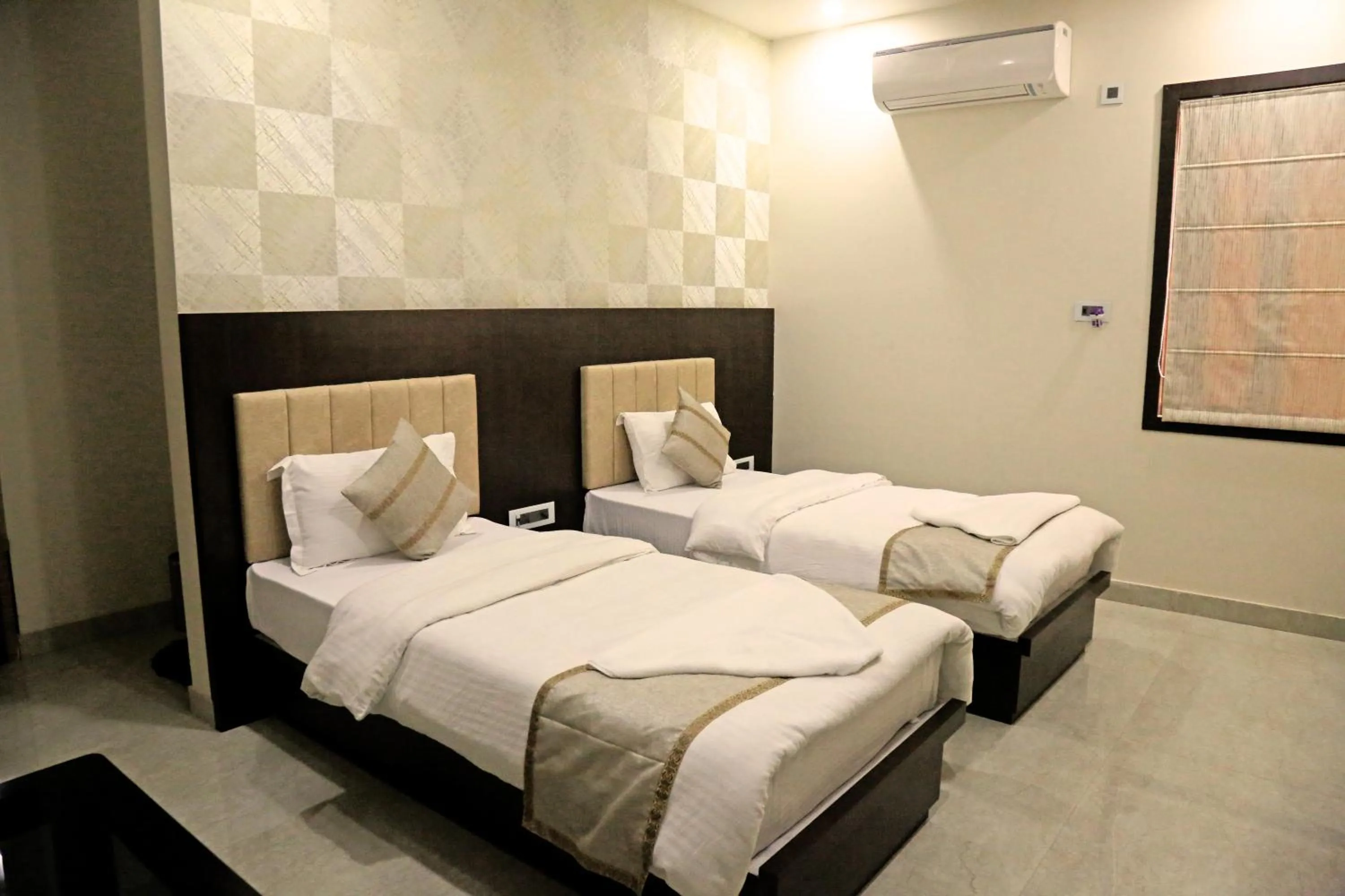 Bedroom in Vandana Residency