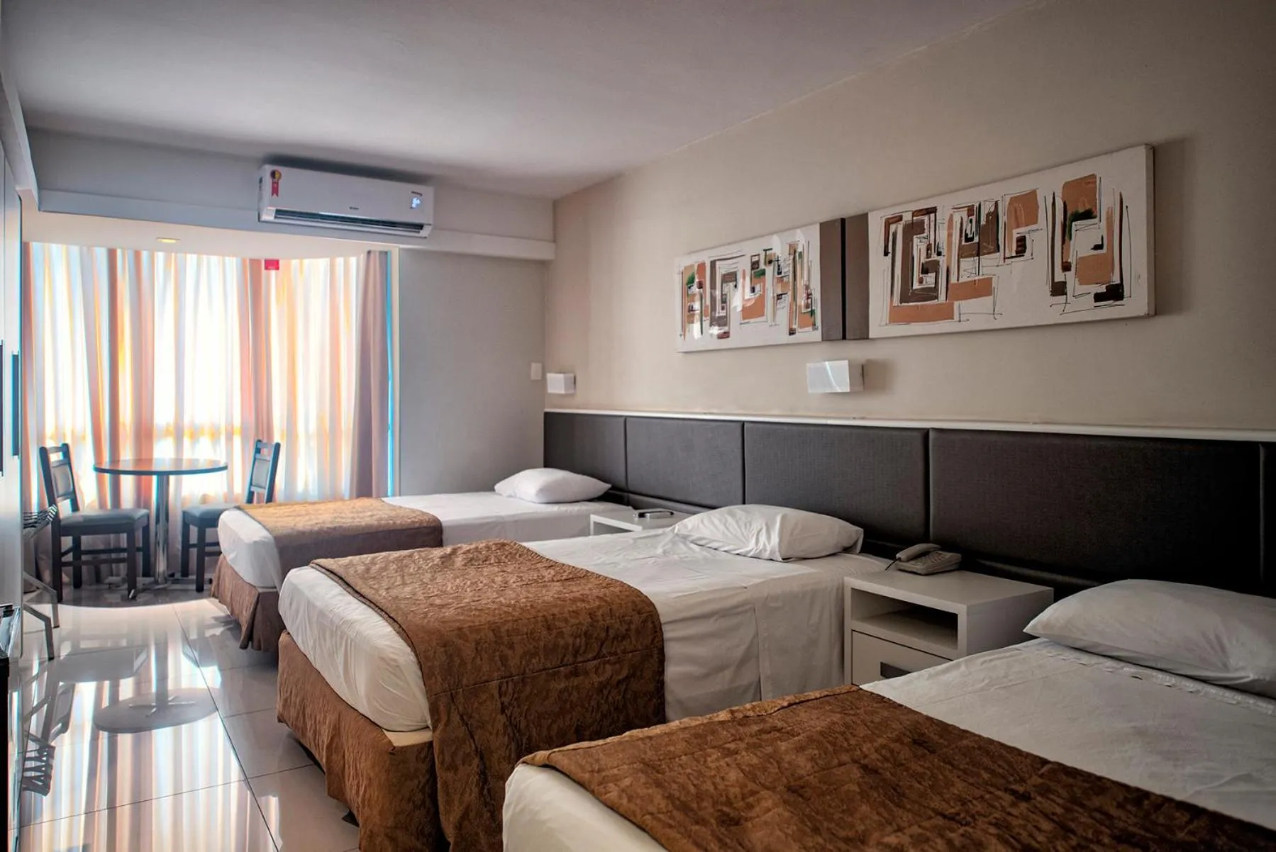 Bed in Rafain Palace Hotel & Convention Center