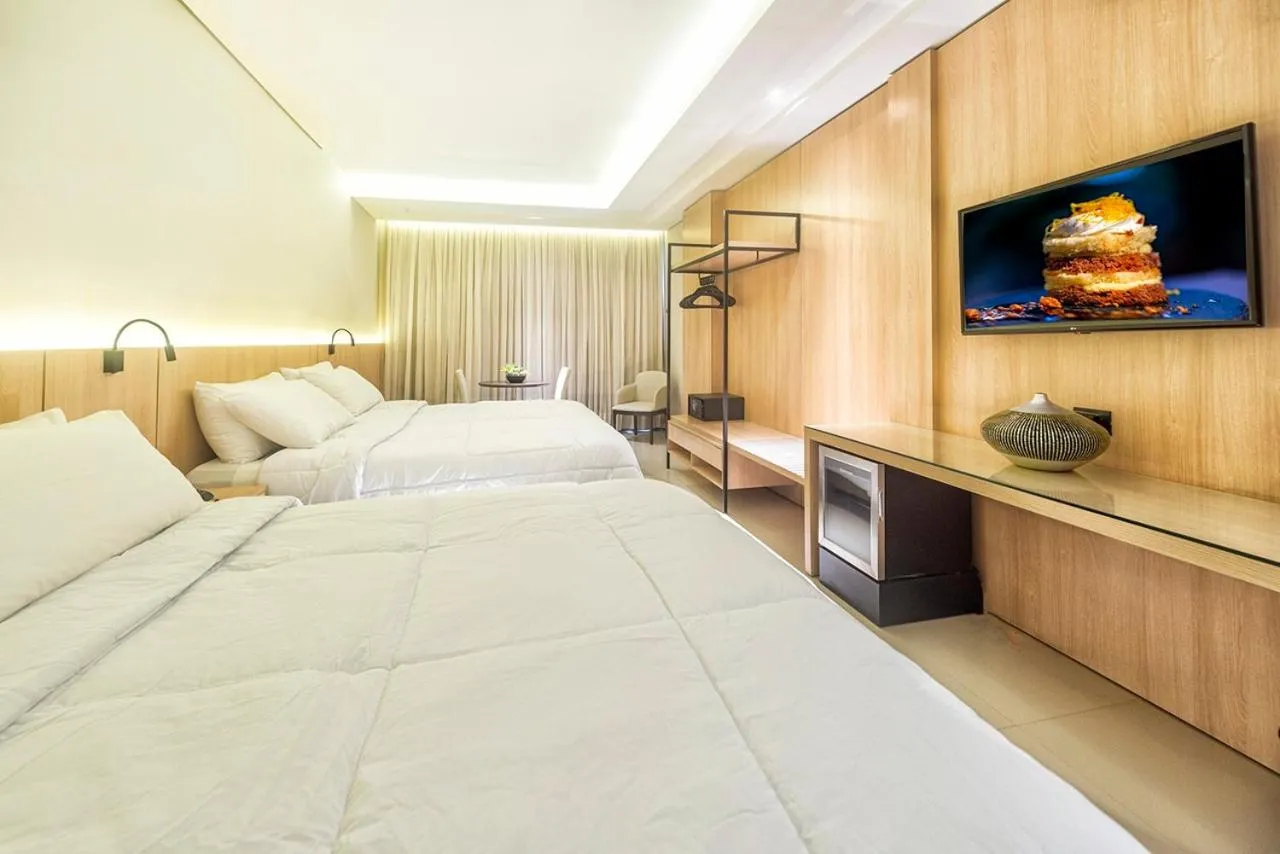 Bed in Rafain Palace Hotel & Convention Center