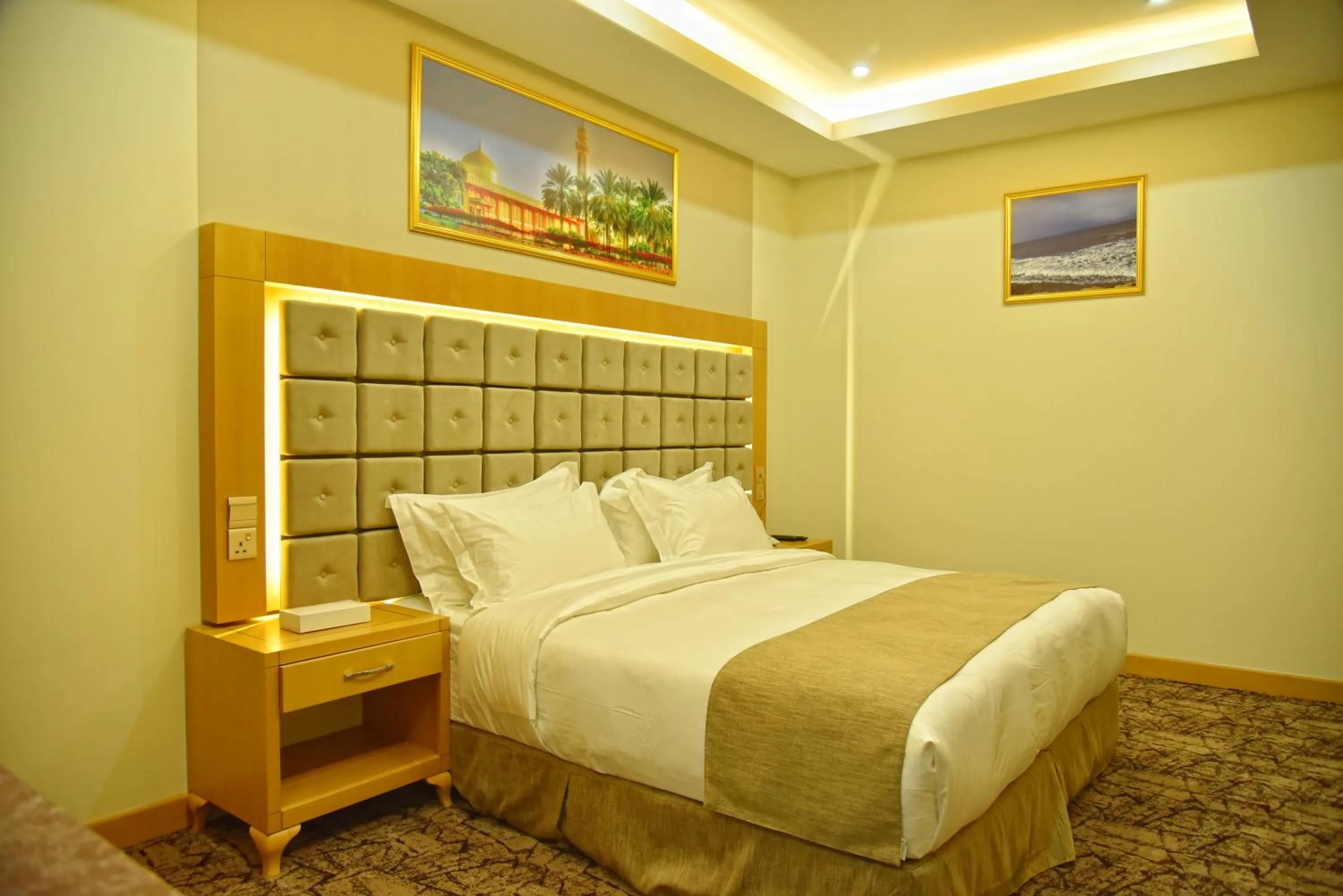 Bed in Muscat Plaza Hotel