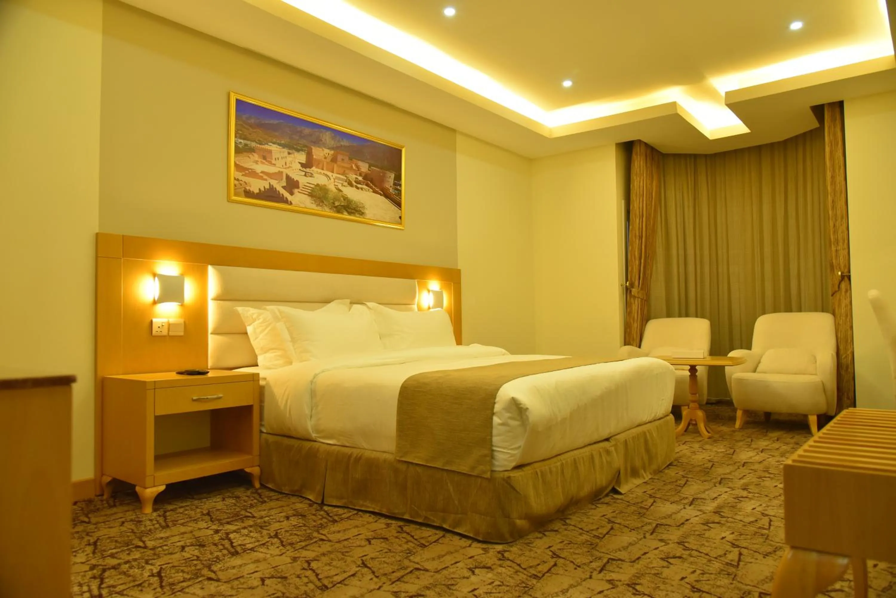 Bed in Muscat Plaza Hotel