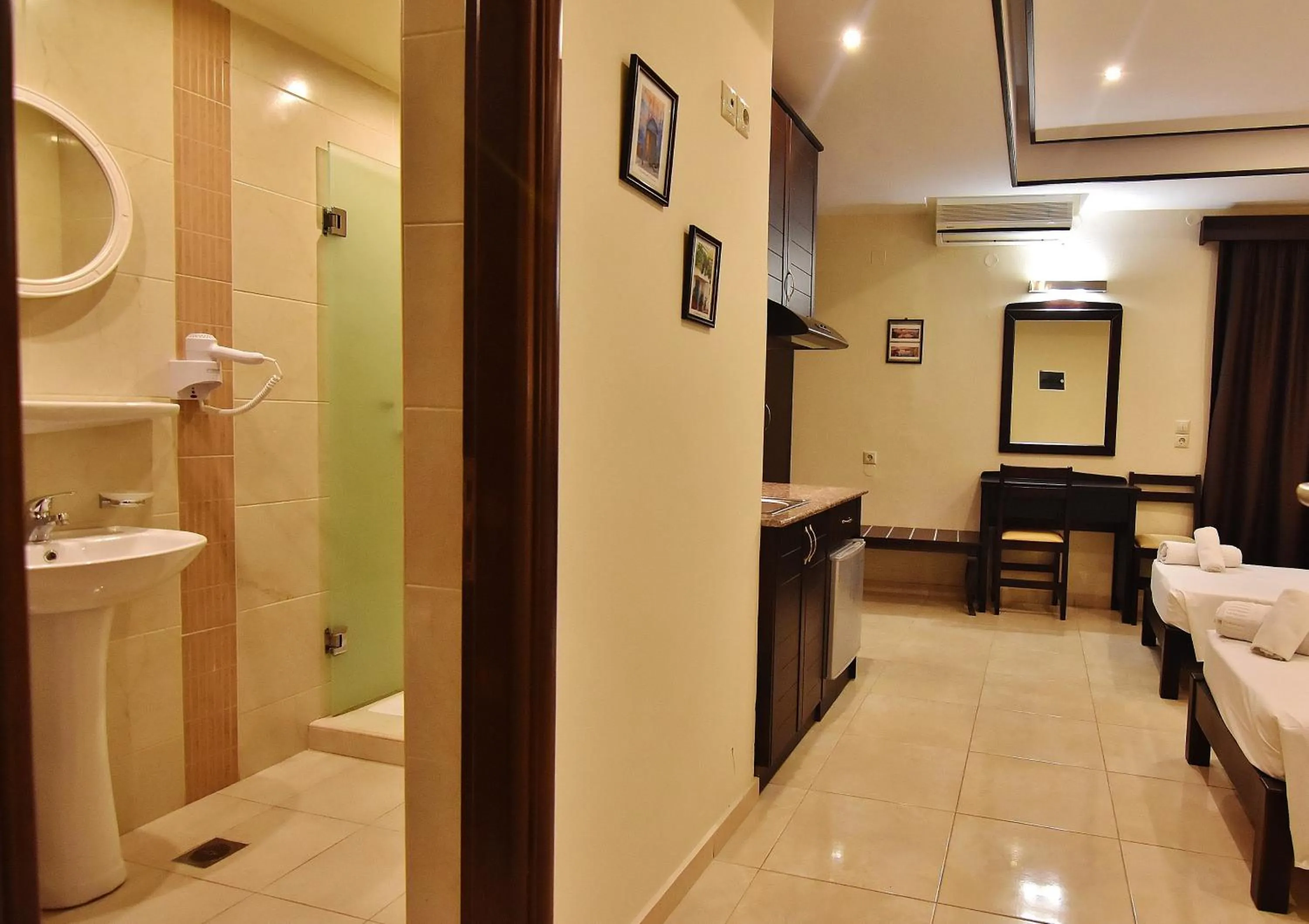 Toilet, Bed in 24 Seven Boutique Hotel