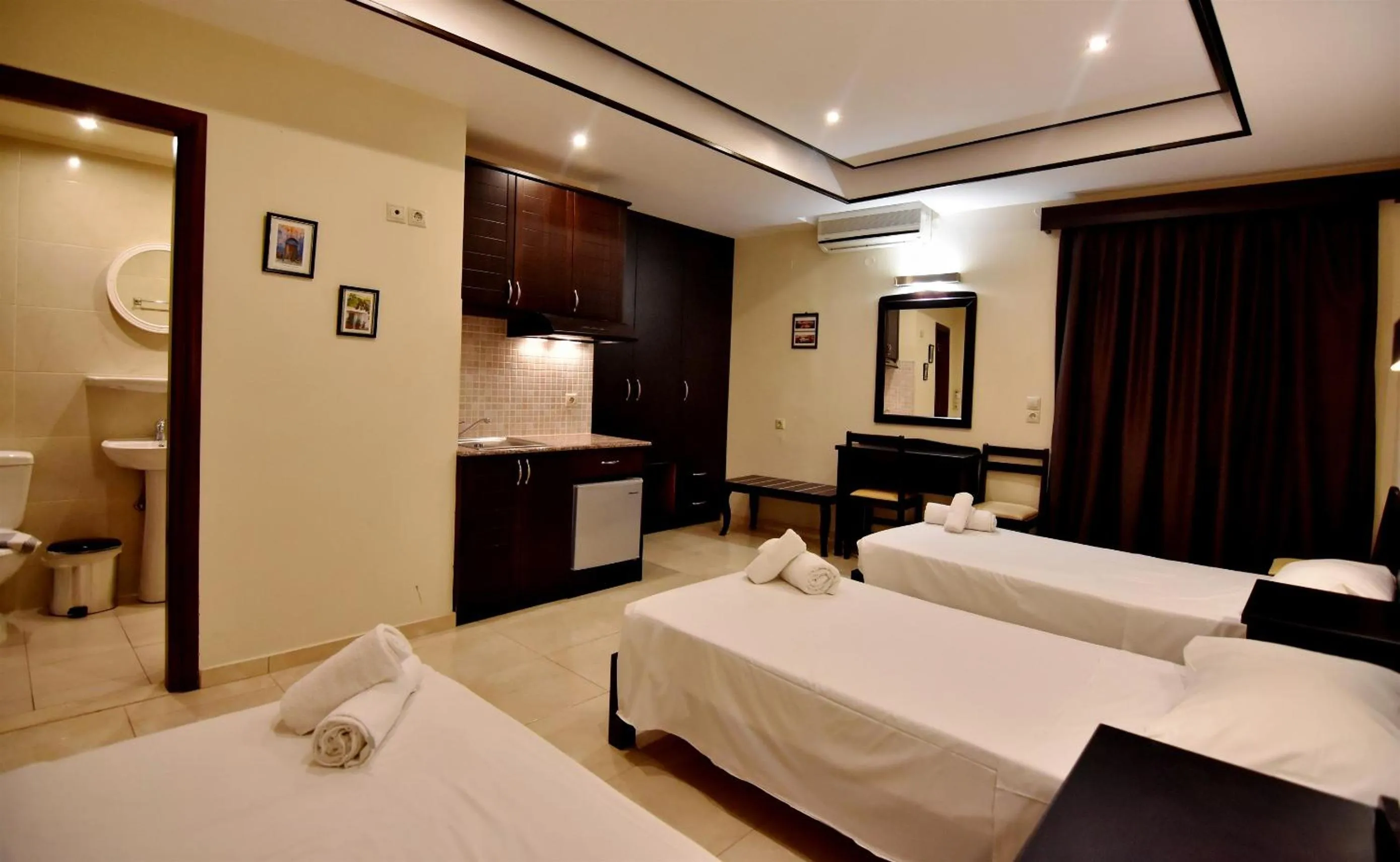 Toilet, Bed in 24 Seven Boutique Hotel