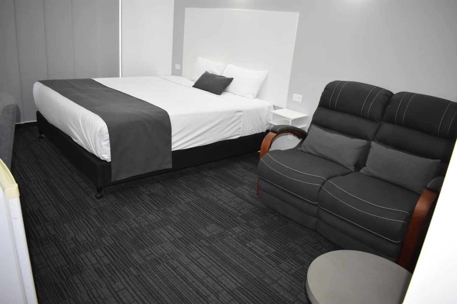 Bed in Riviana Motel