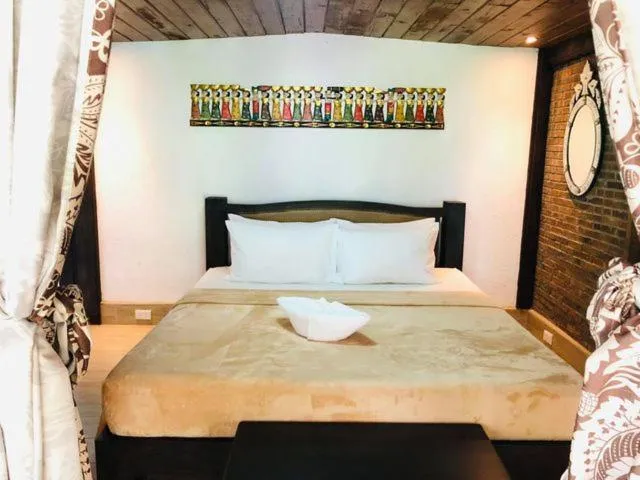 Bed in Chema's by the Sea