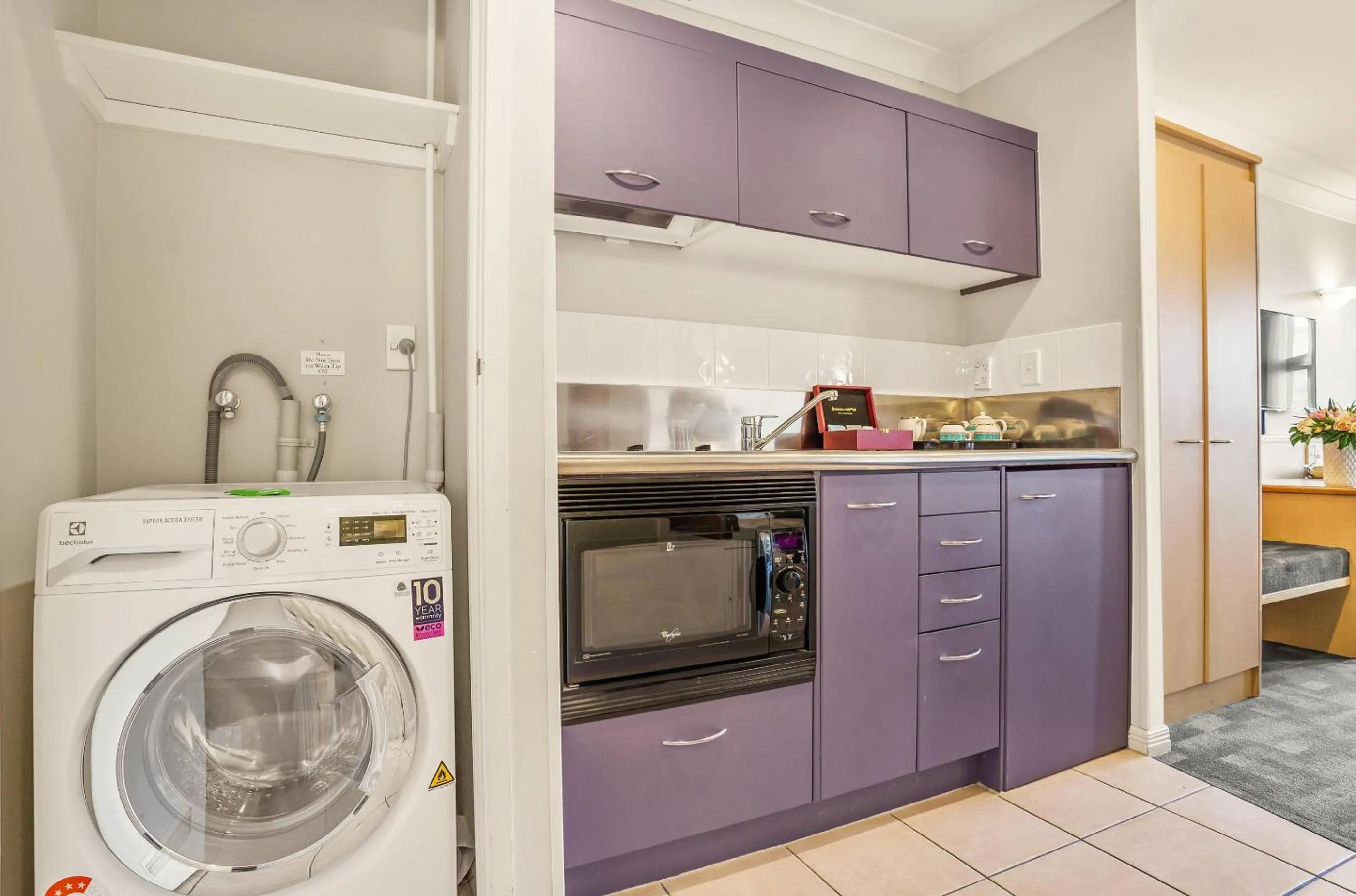 Kitchen or kitchenette in Parkside Hotel & Apartments