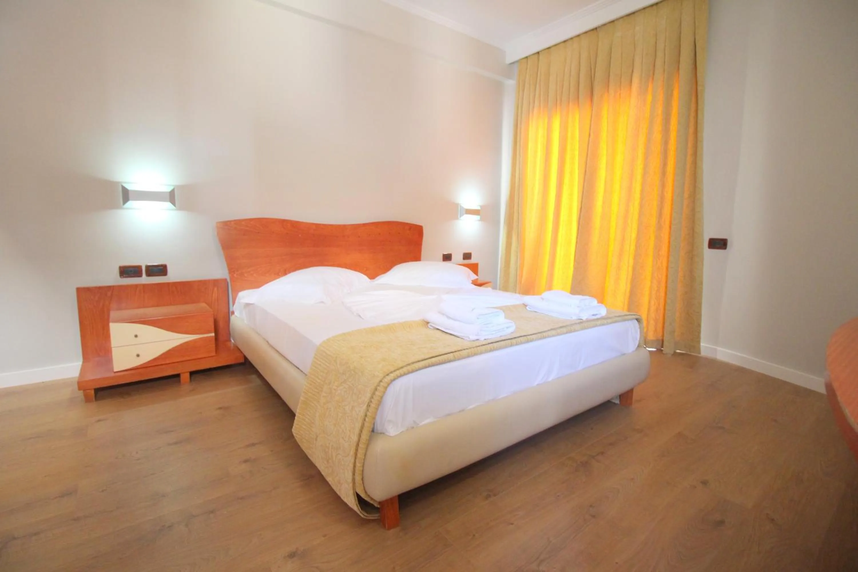 Bed in Hotel Saranda International