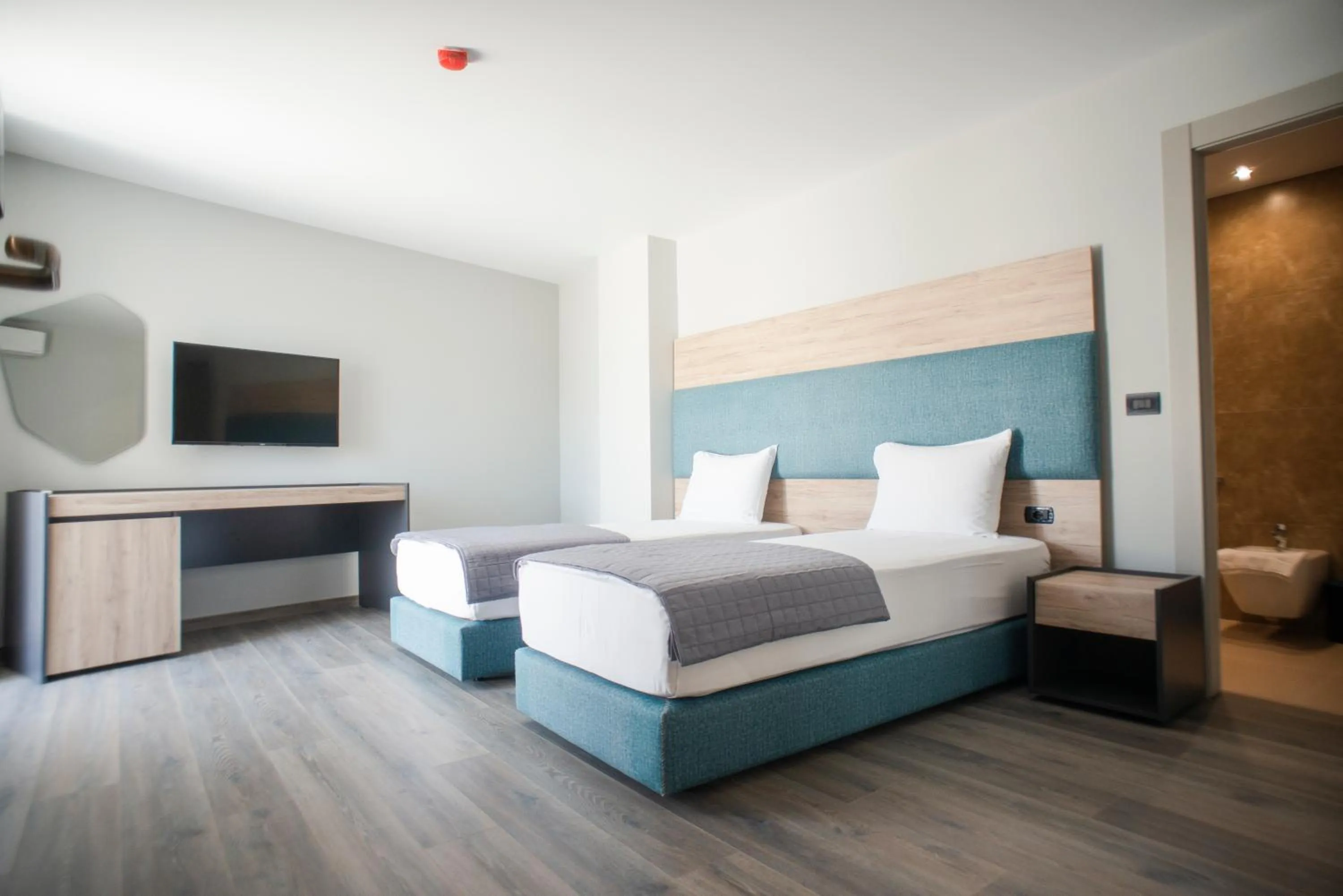 Bed in Hotel Saranda International