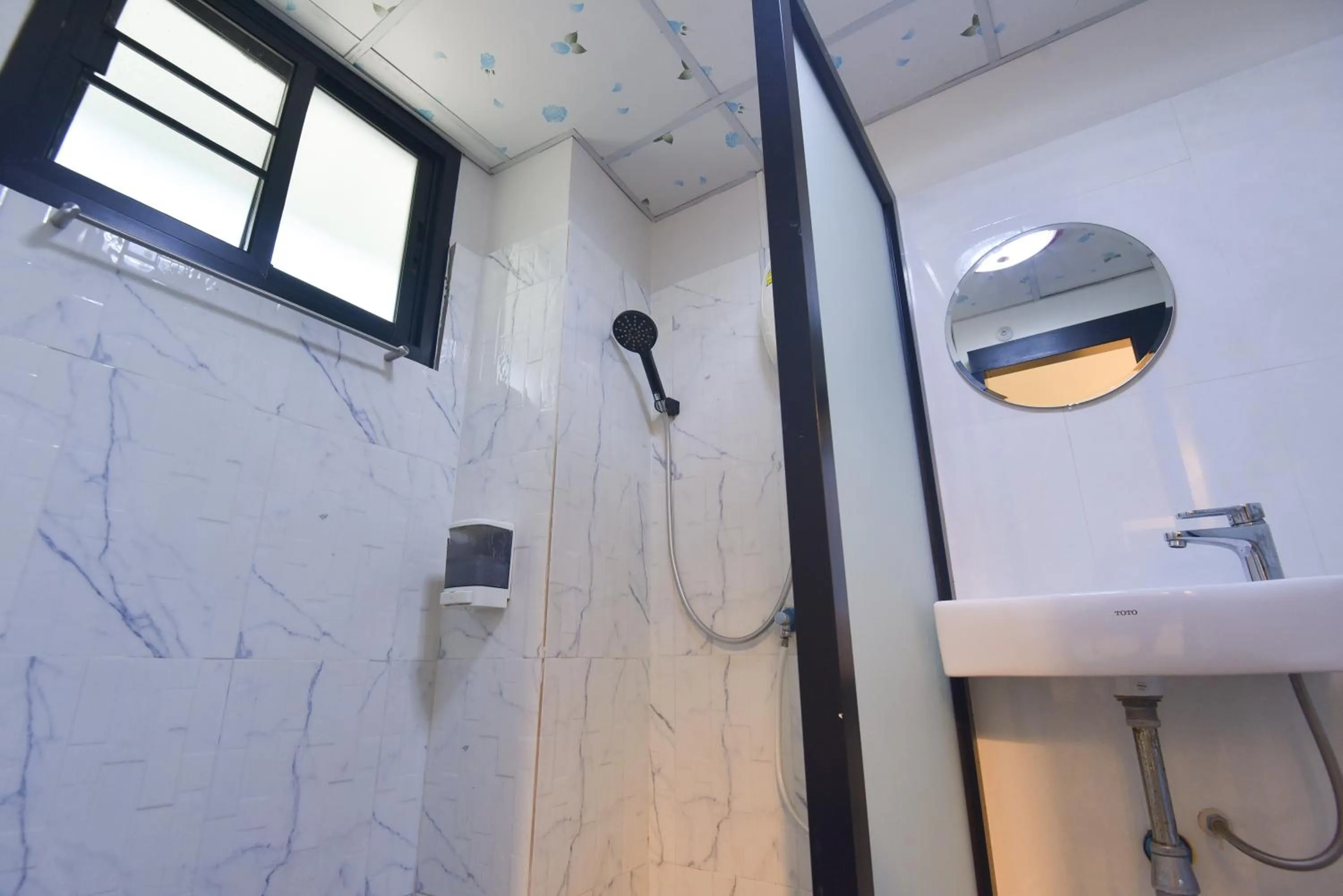 Shower in P.U. Inn Resort