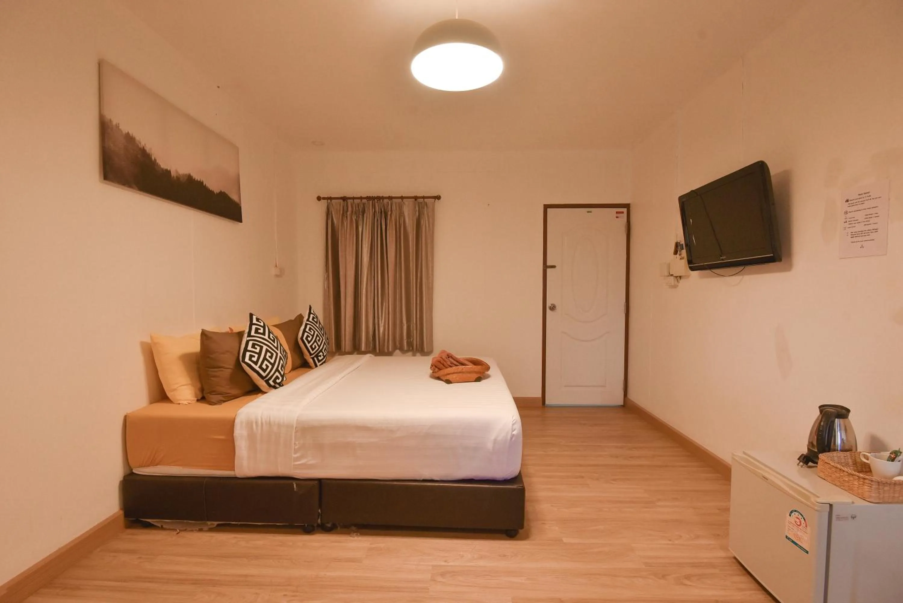 Bed in P.U. Inn Resort