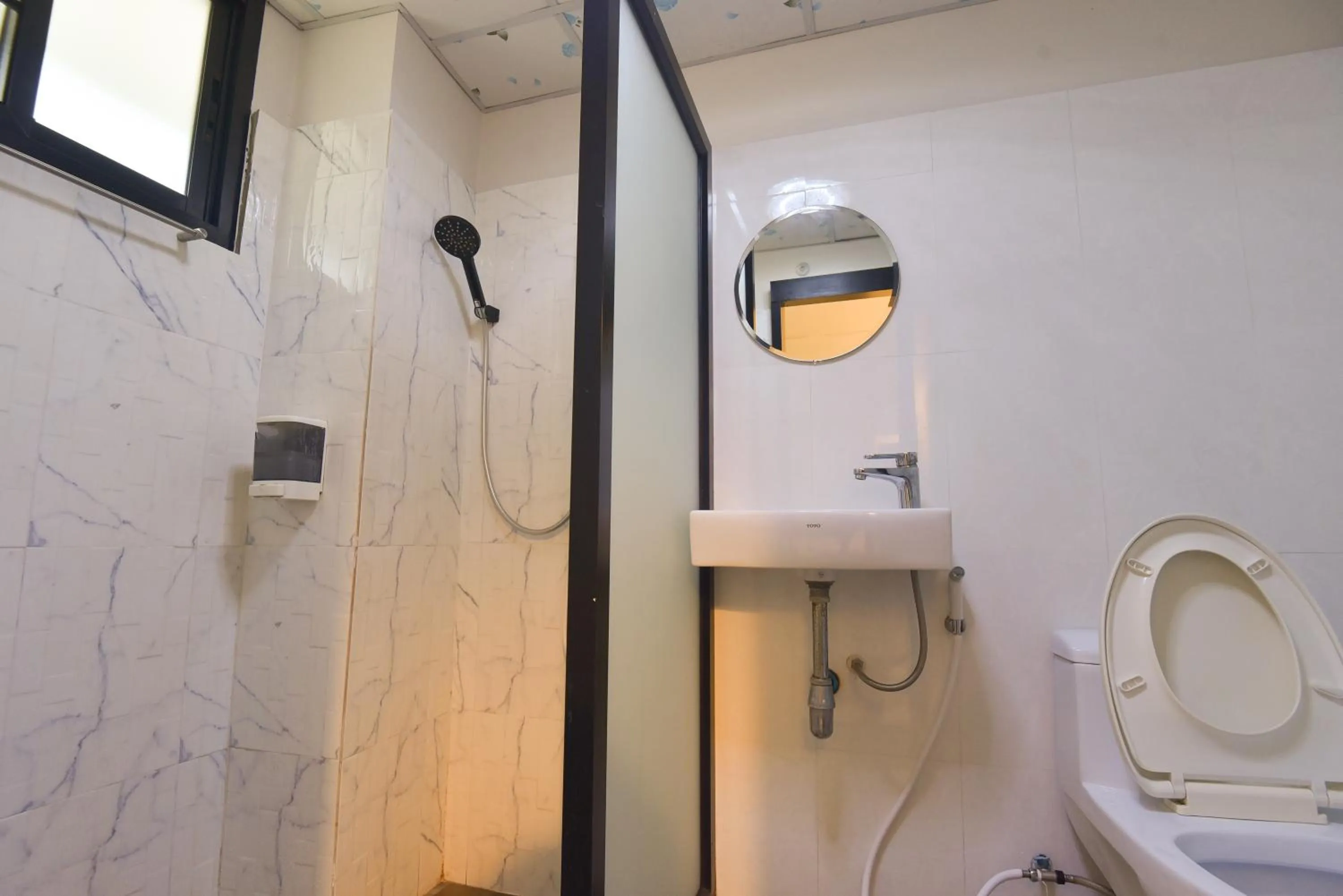 Shower in P.U. Inn Resort