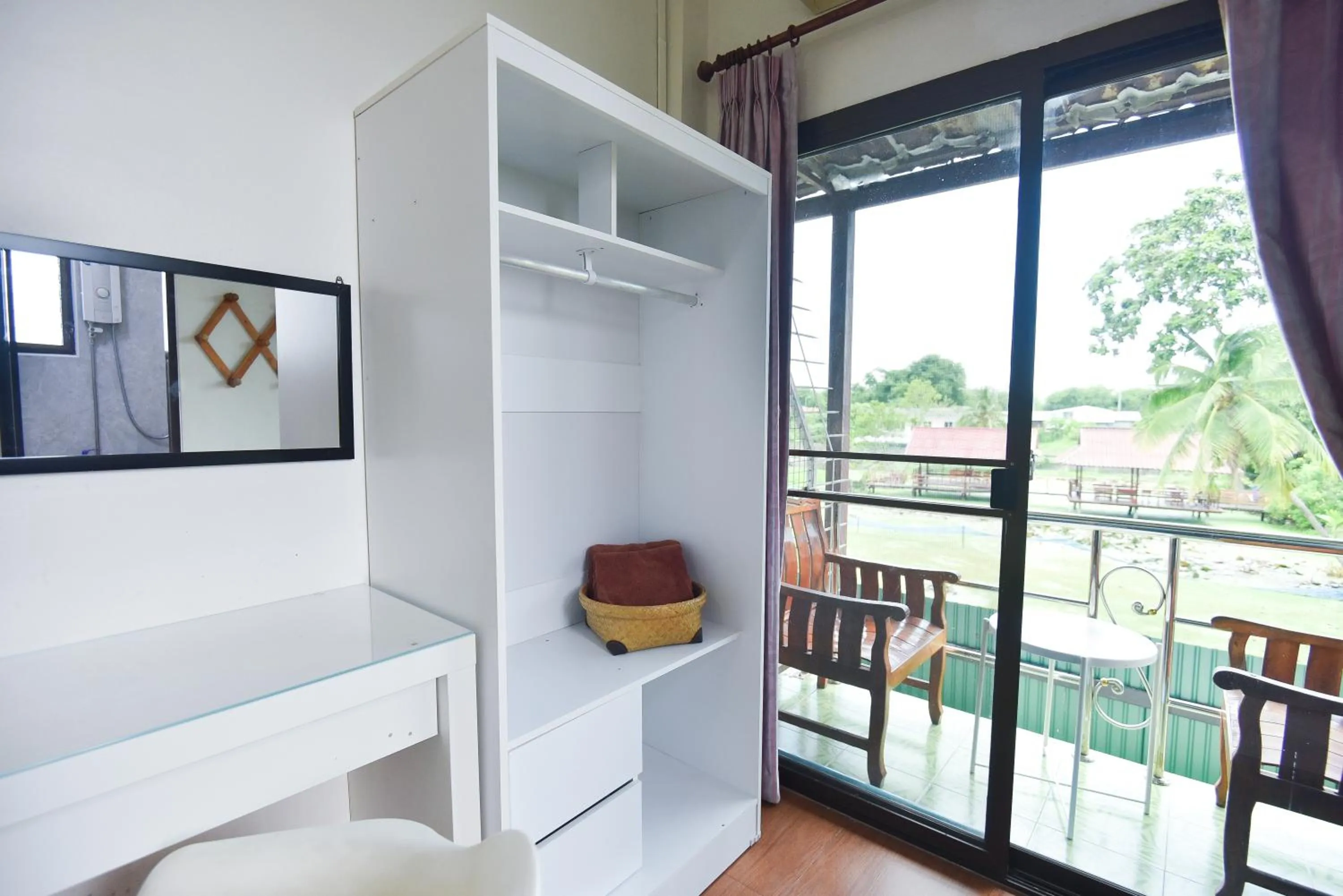 Bedroom in P.U. Inn Resort