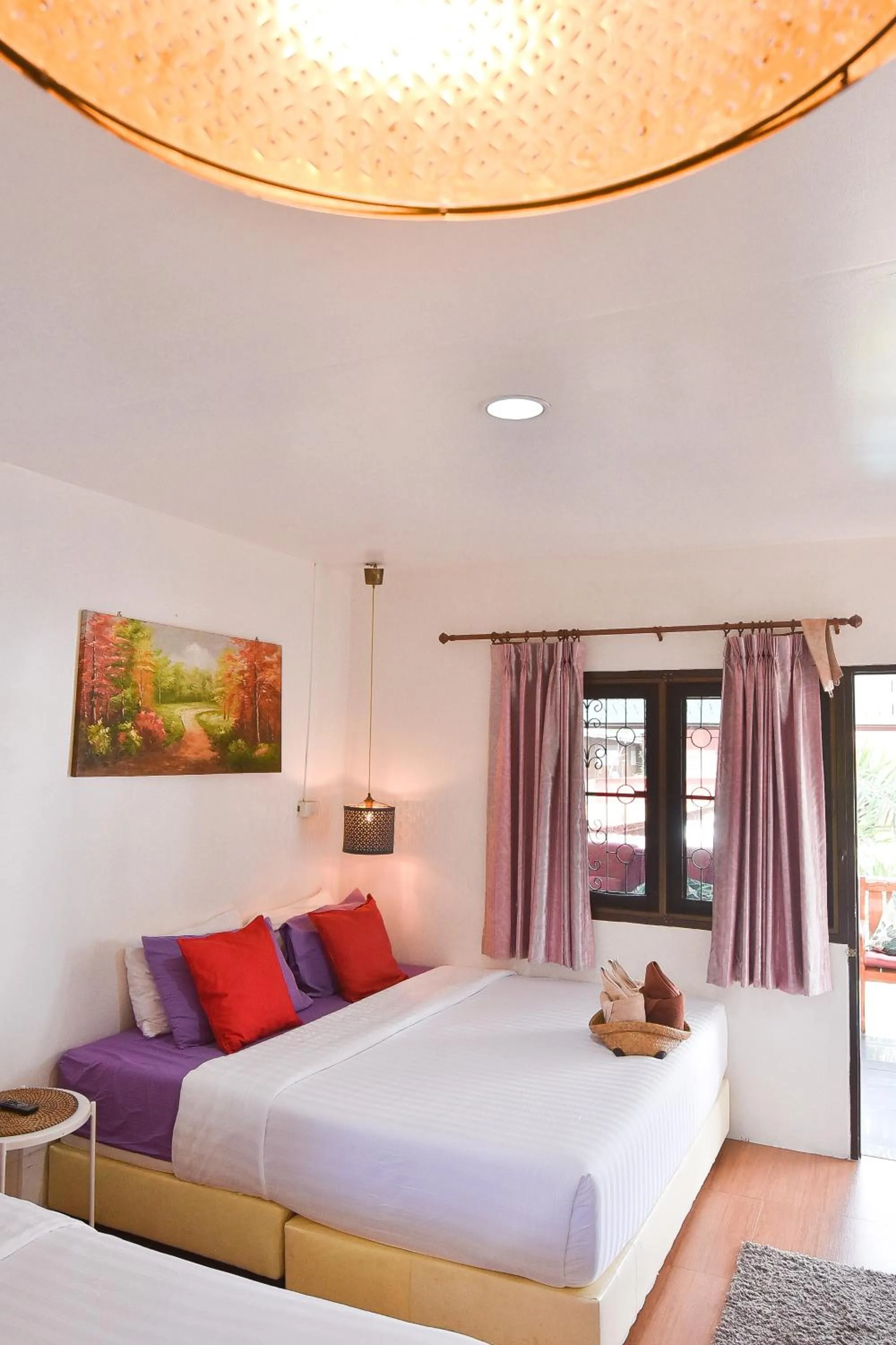 Bed in P.U. Inn Resort