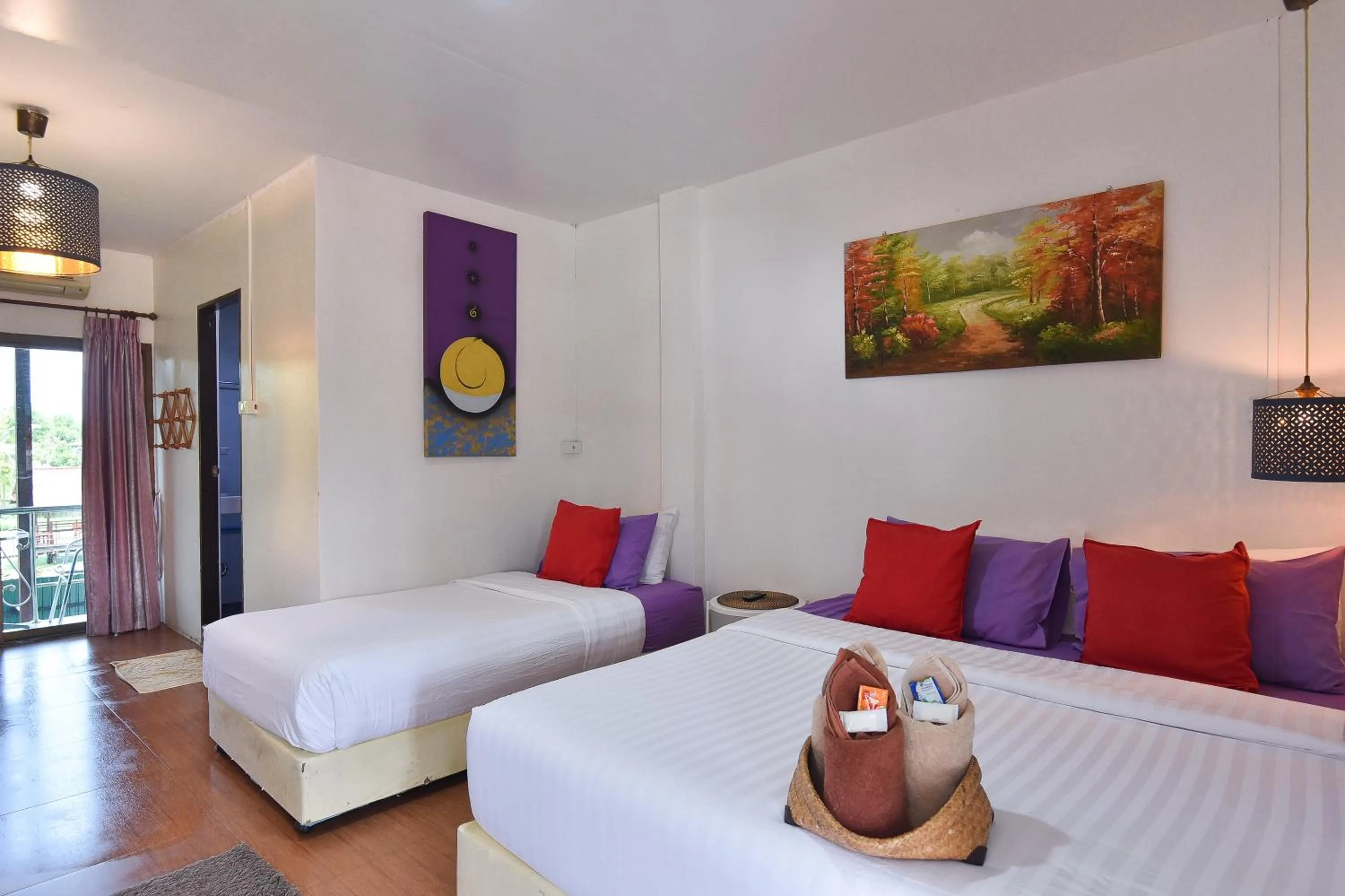 Living room, Bed in P.U. Inn Resort