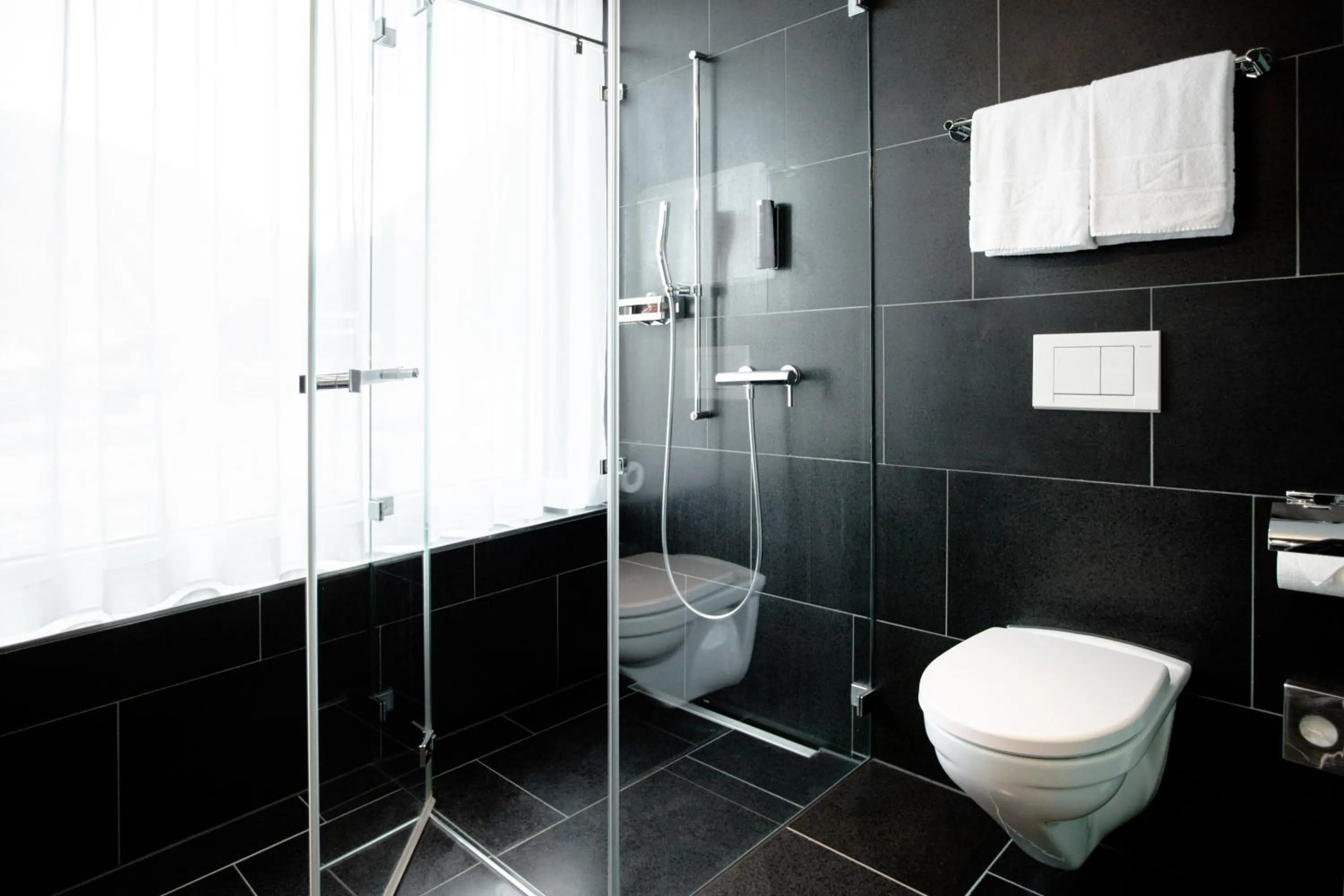 Bathroom in Mercure Chur City West