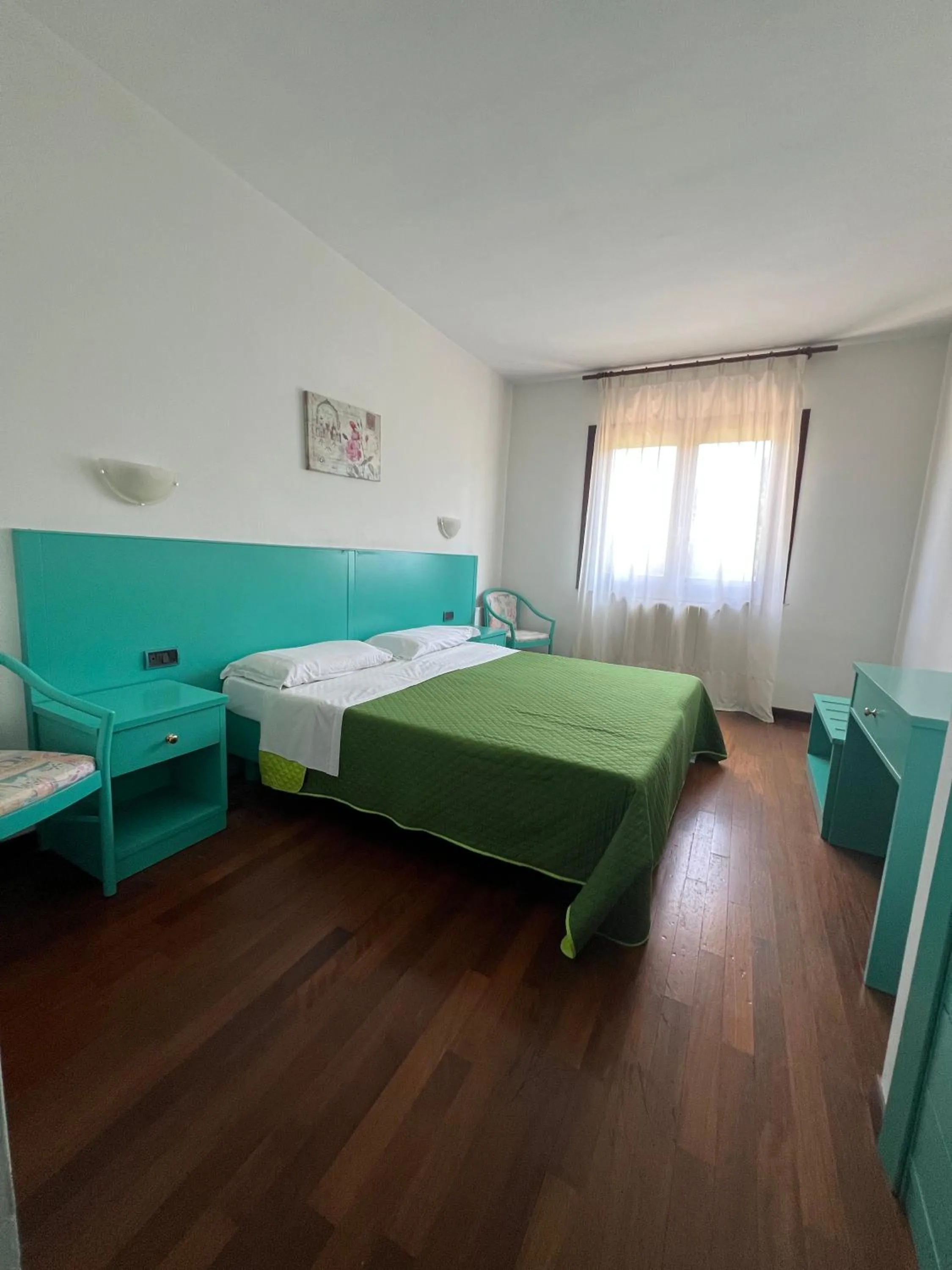 Bed in Hotel Verdeneve