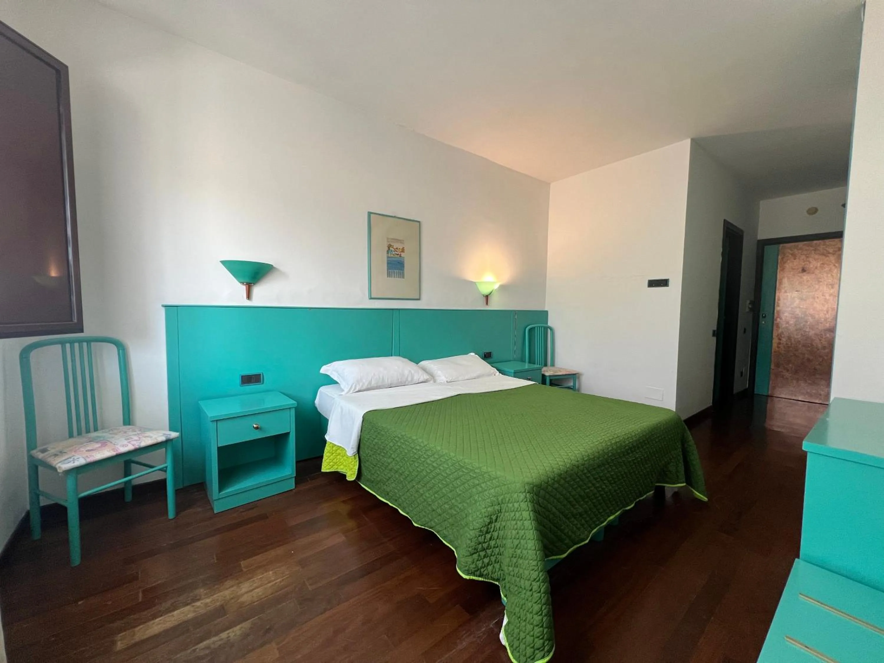 Bed in Hotel Verdeneve