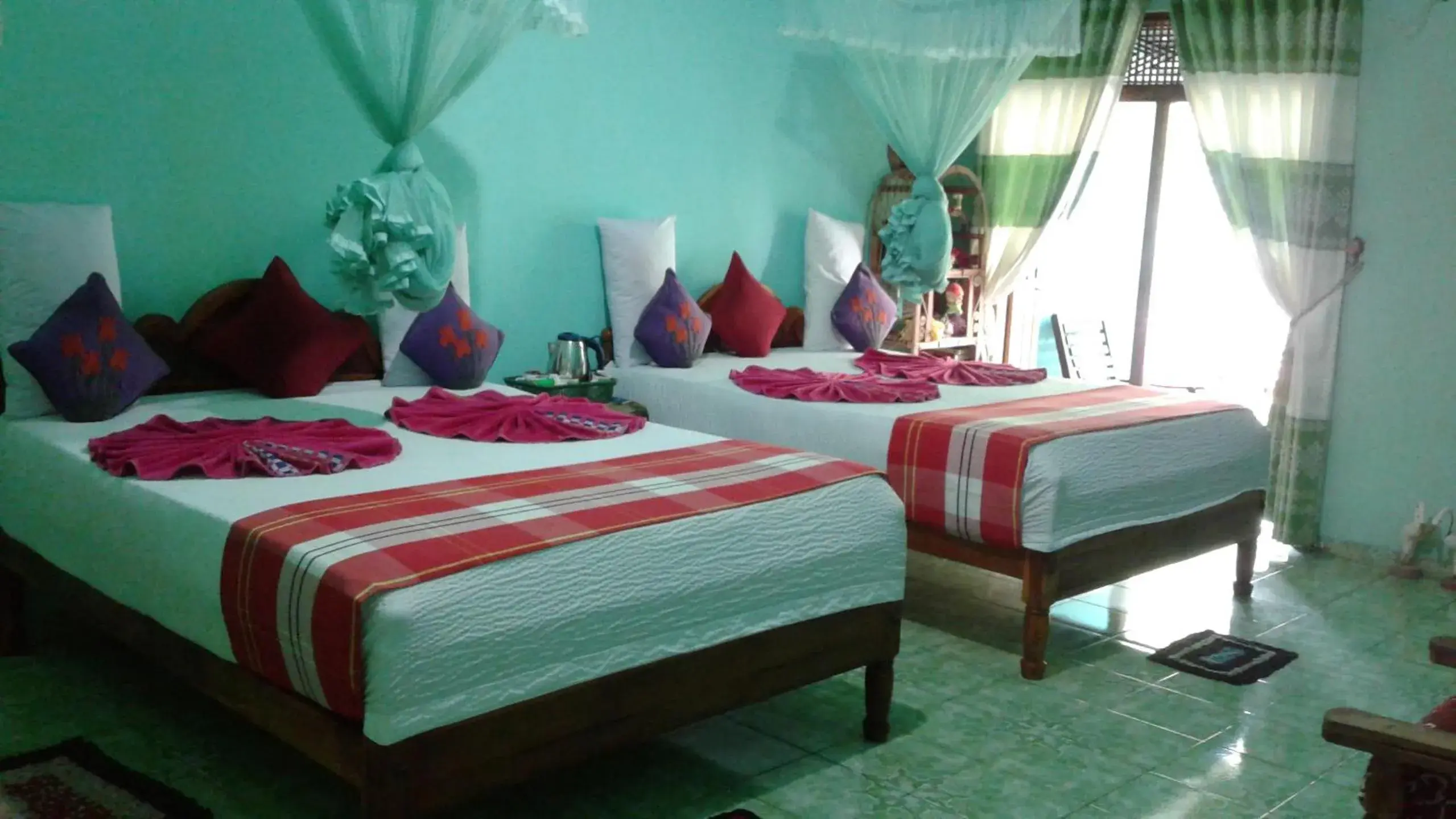 Family Room with Garden View in Flower Inn Family Room with Garden View in Flower Inn