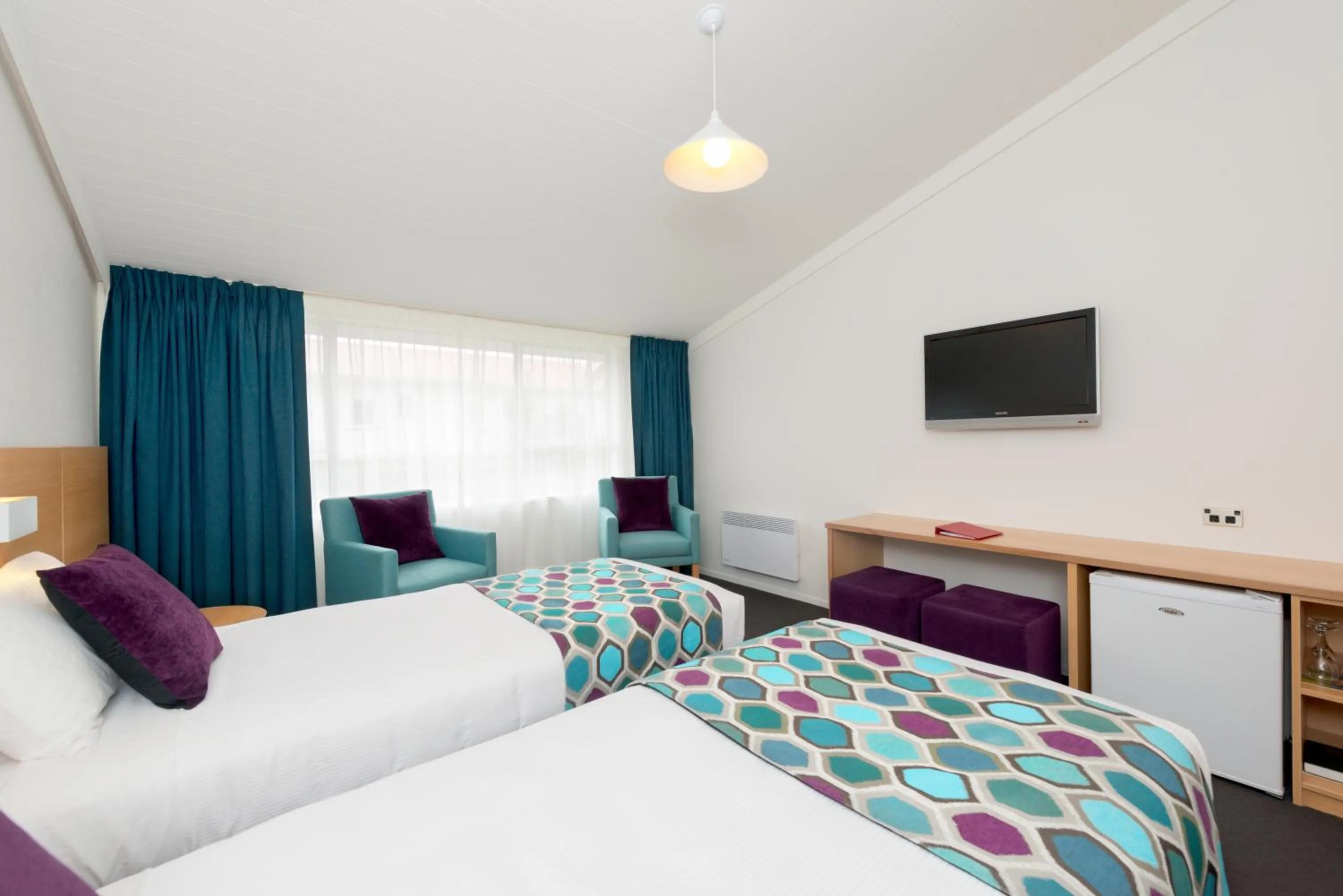 Bedroom, Bed in Heartland Hotel Fox Glacier