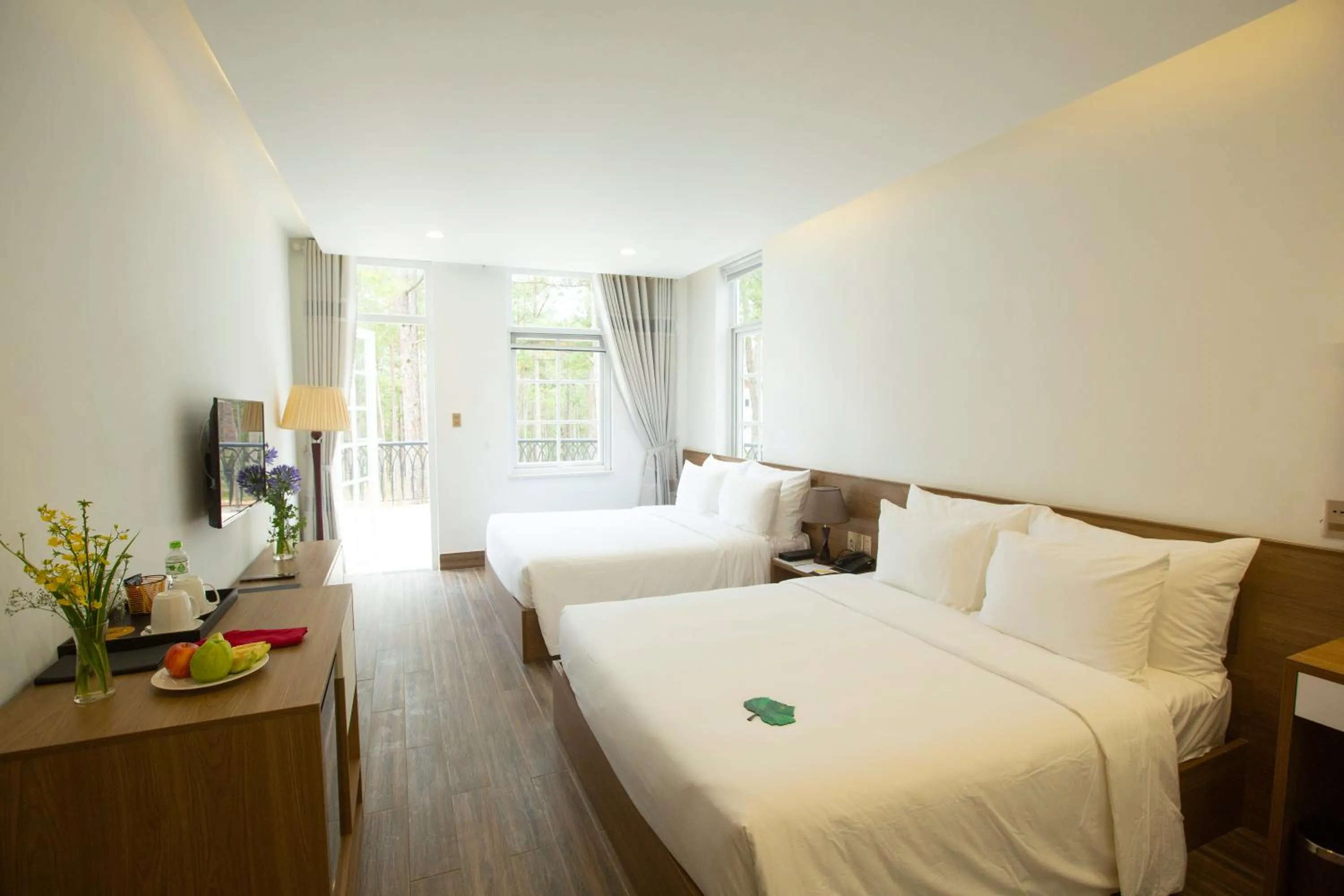 Photo of the whole room, Bed in CEREJA Hotel & Resort Dalat