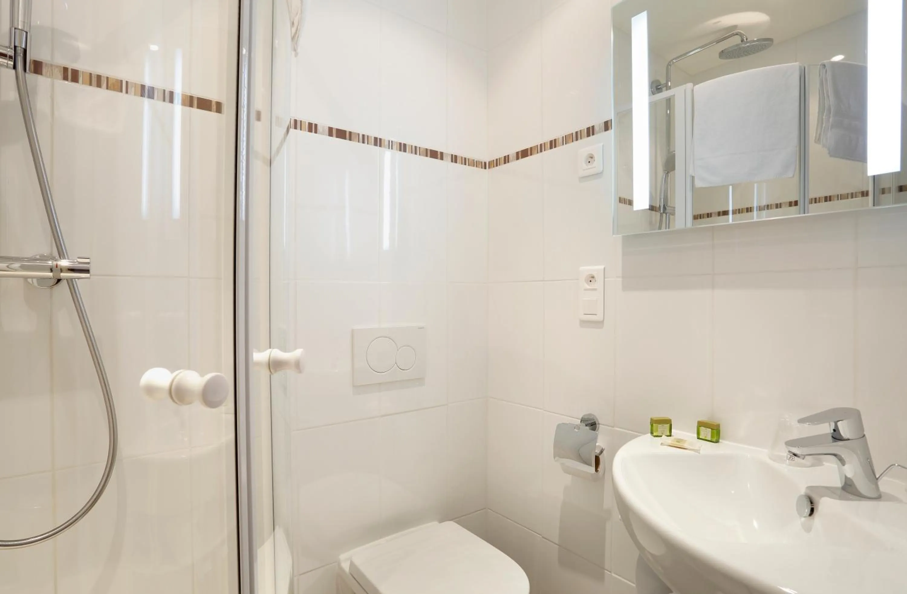 Shower in HOTEL LES MARRONNIERS