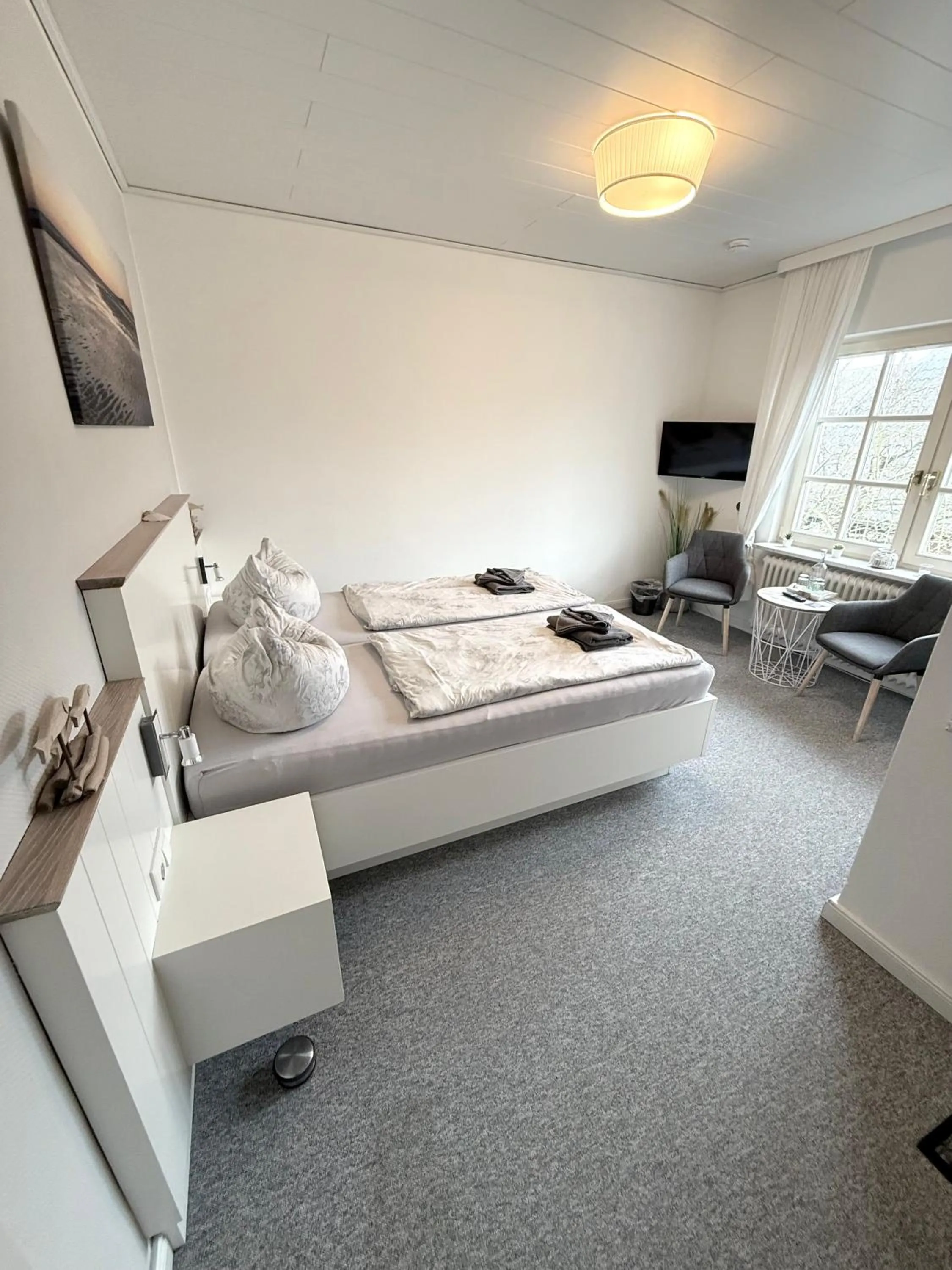 Photo of the whole room, Bed in Hotel garni Seeluft Büsum