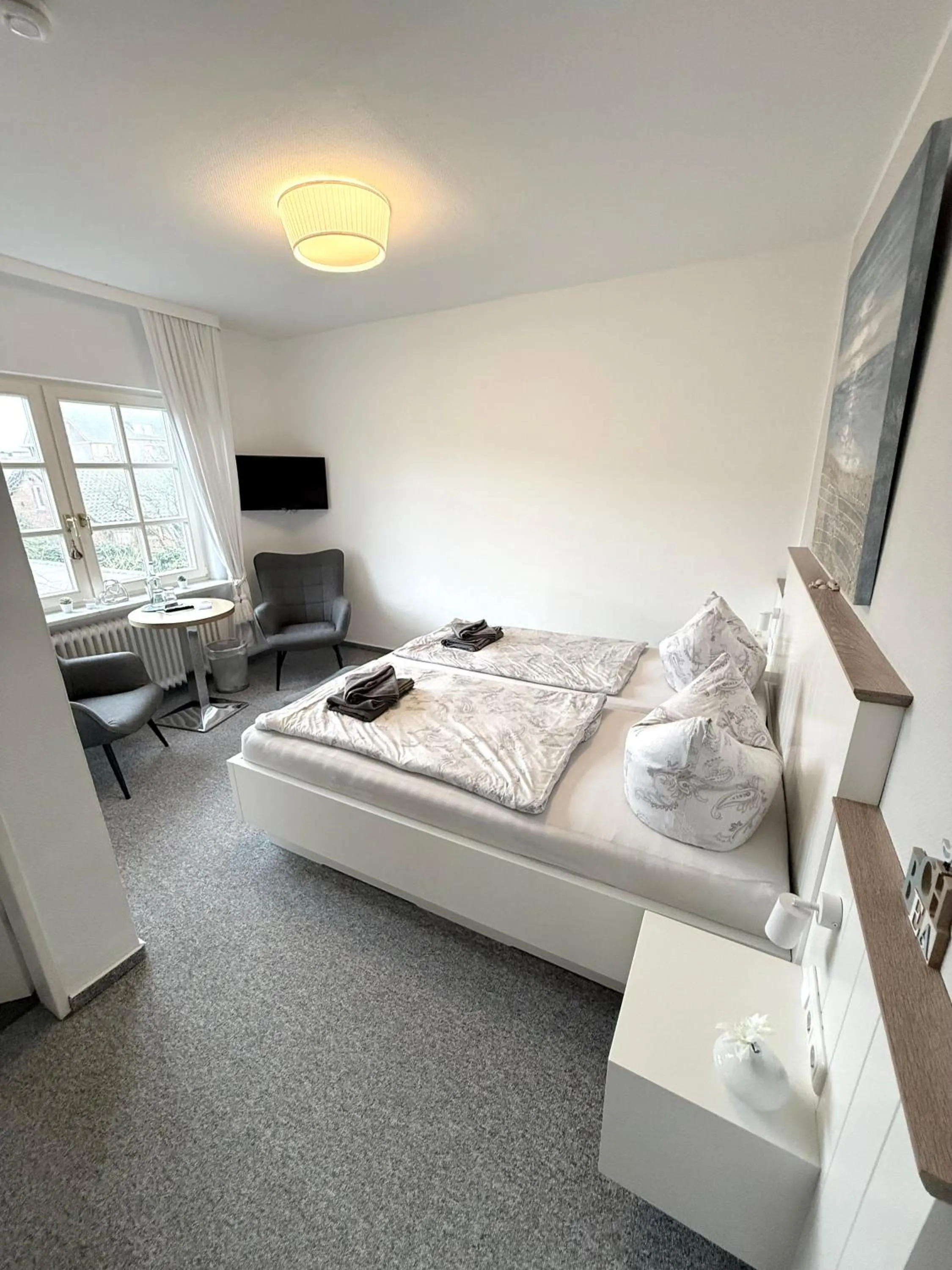 Photo of the whole room, Bed in Hotel garni Seeluft Büsum