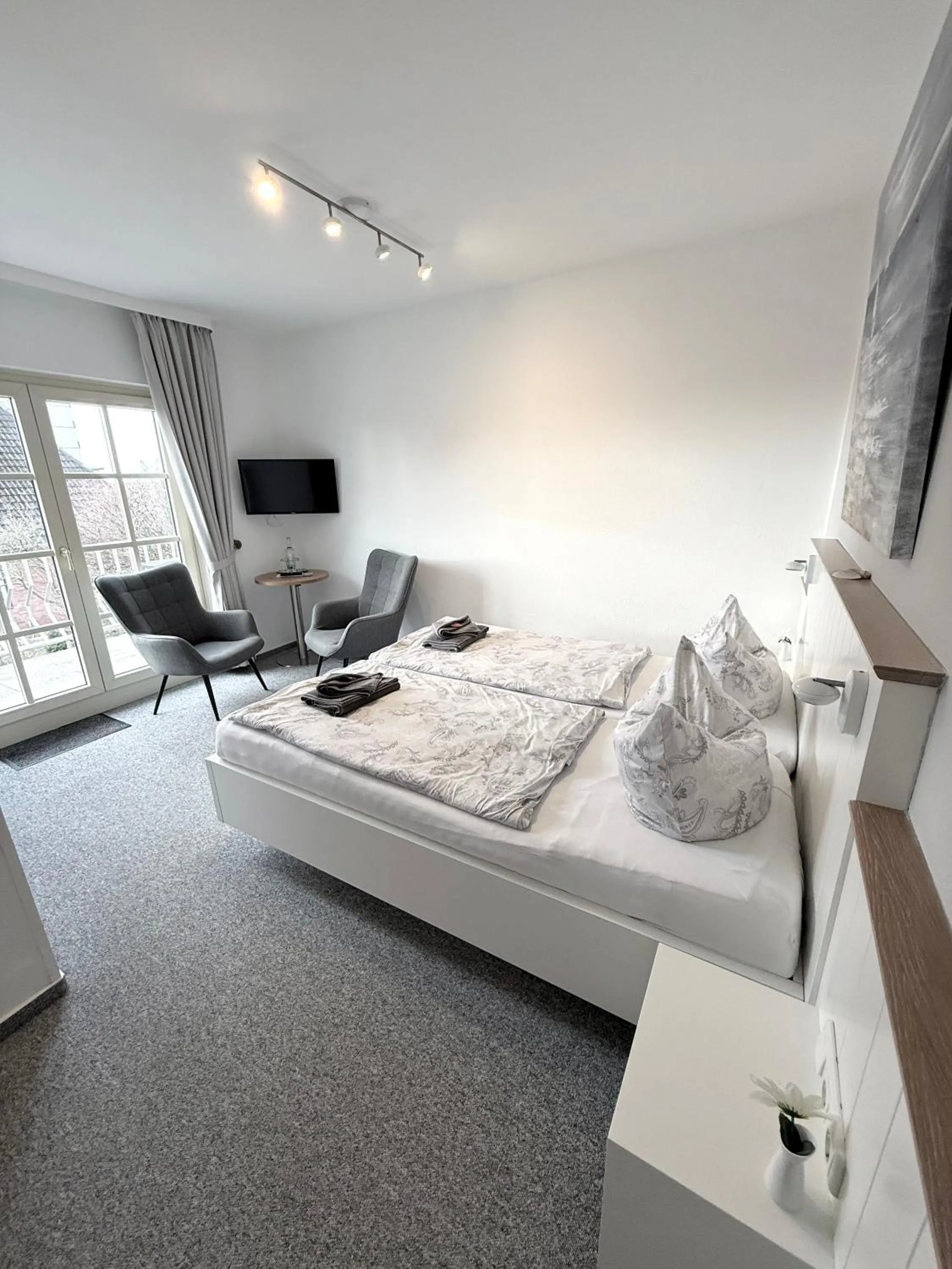 Photo of the whole room, Bed in Hotel garni Seeluft Büsum