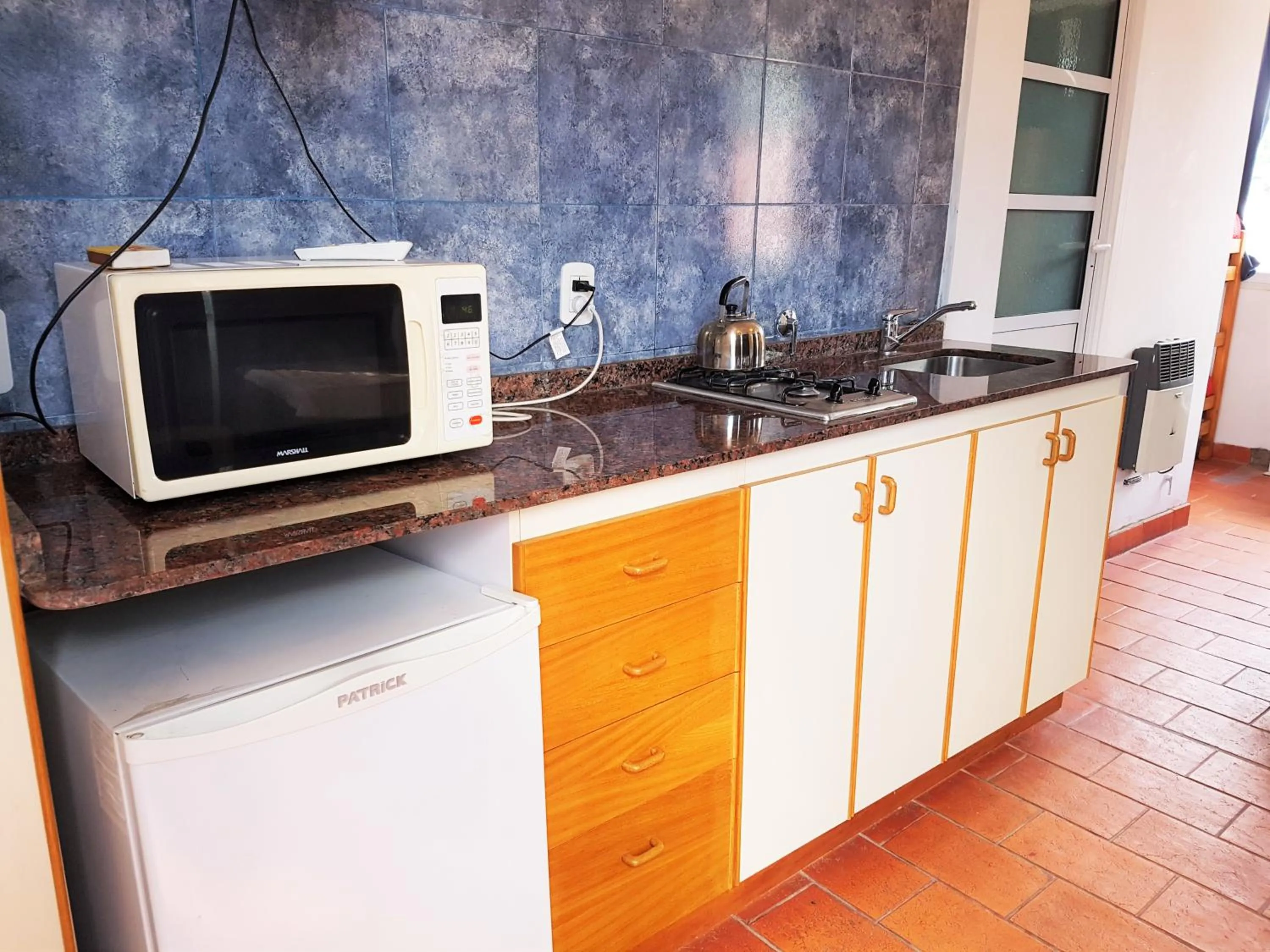 Kitchen or kitchenette in Azul Departamentos