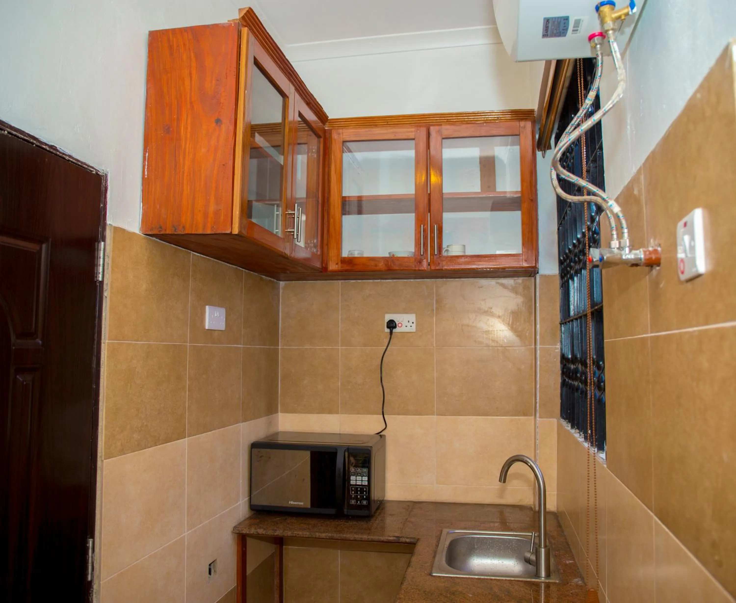 Kitchen or kitchenette in Mikocheni Condo Hotel & Apartments
