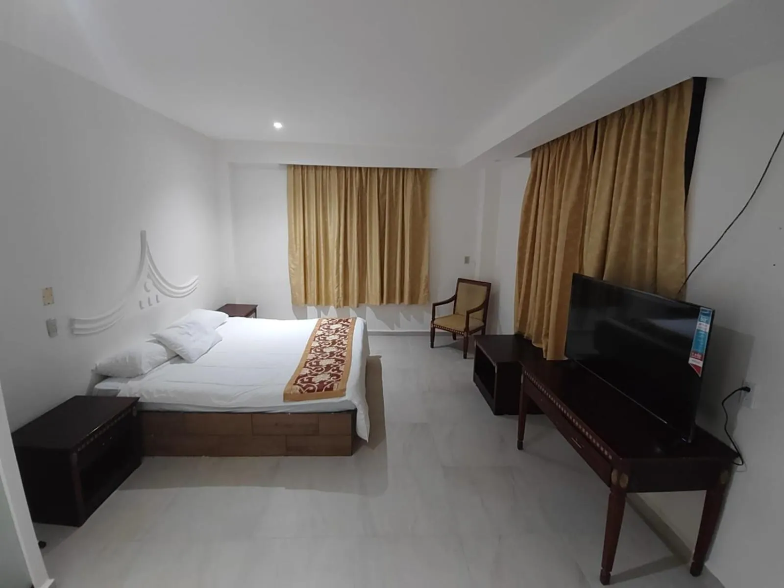 Bed in Hotel Mandarin