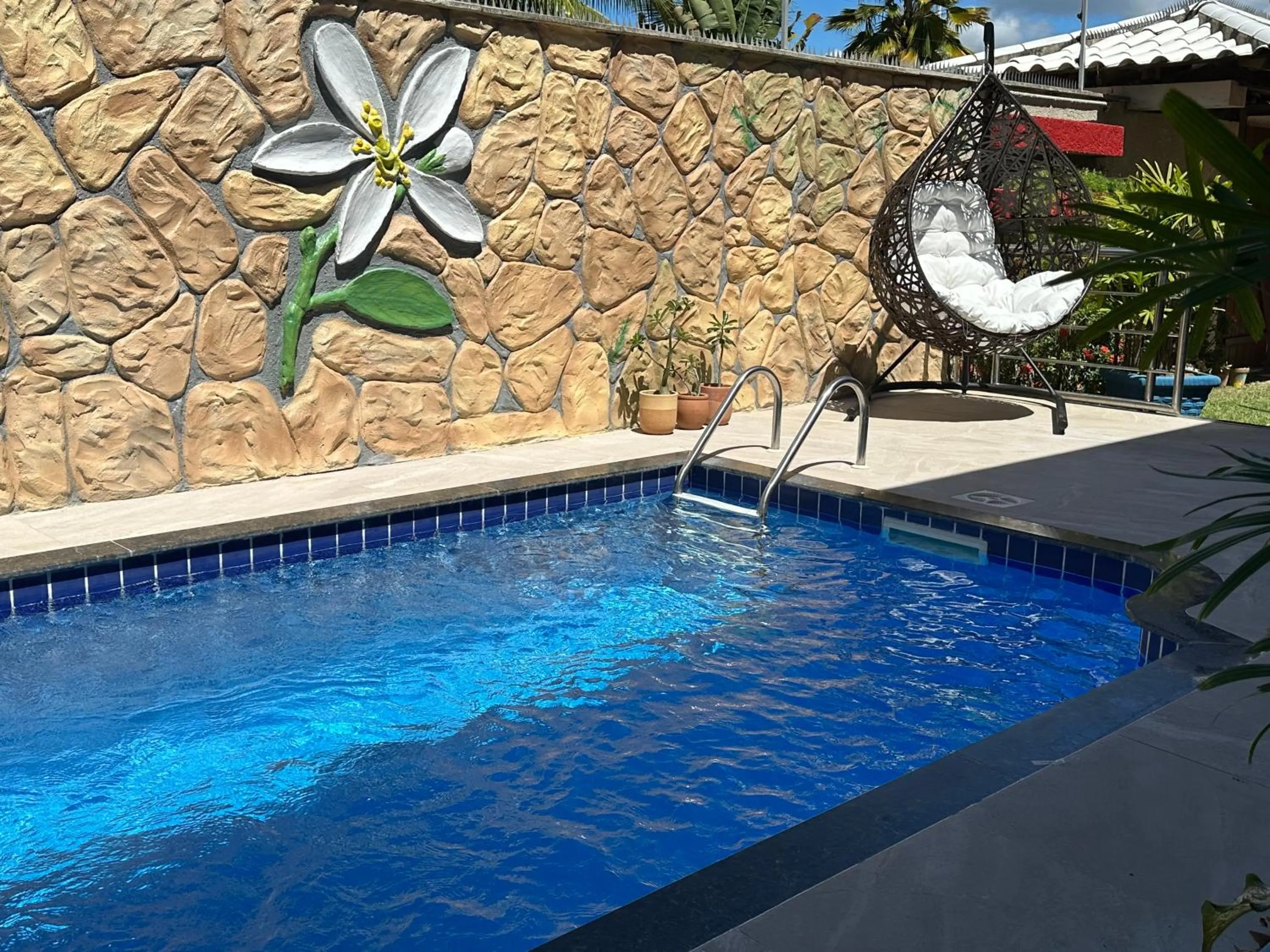 Swimming pool in Flor de Limão Hotel Boutique