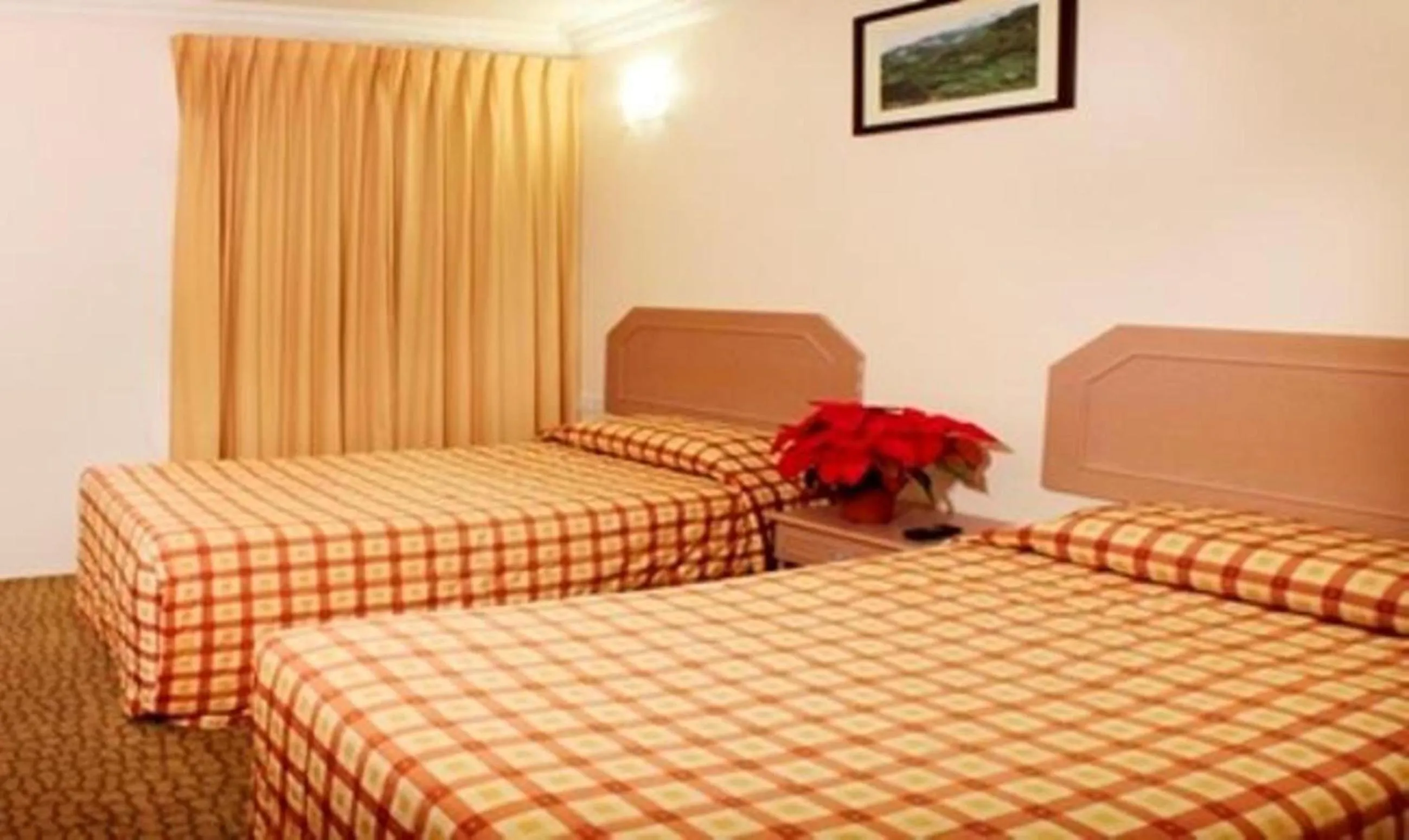 Bed in Jasmine Hotel