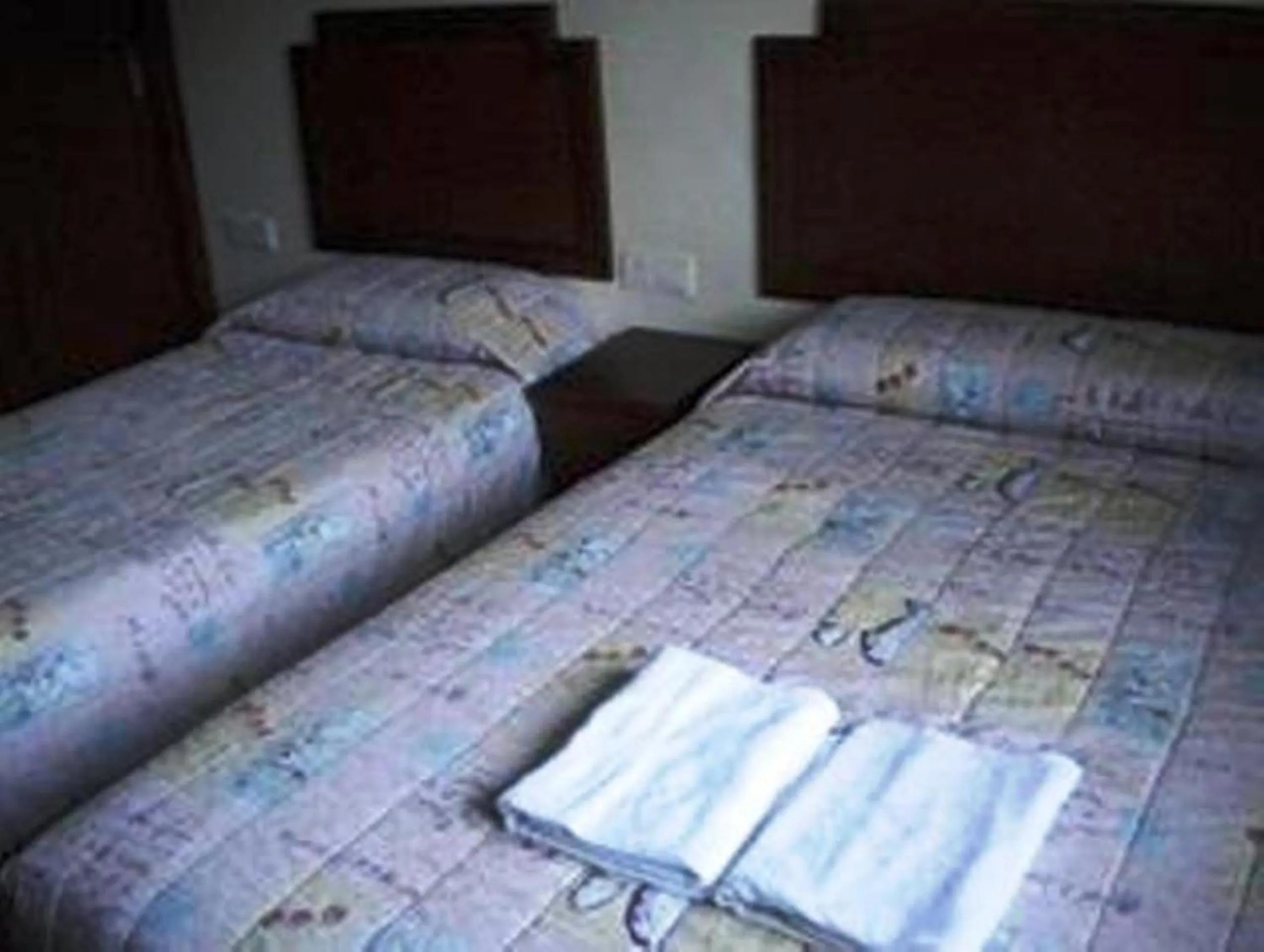 Bed in Jasmine Hotel