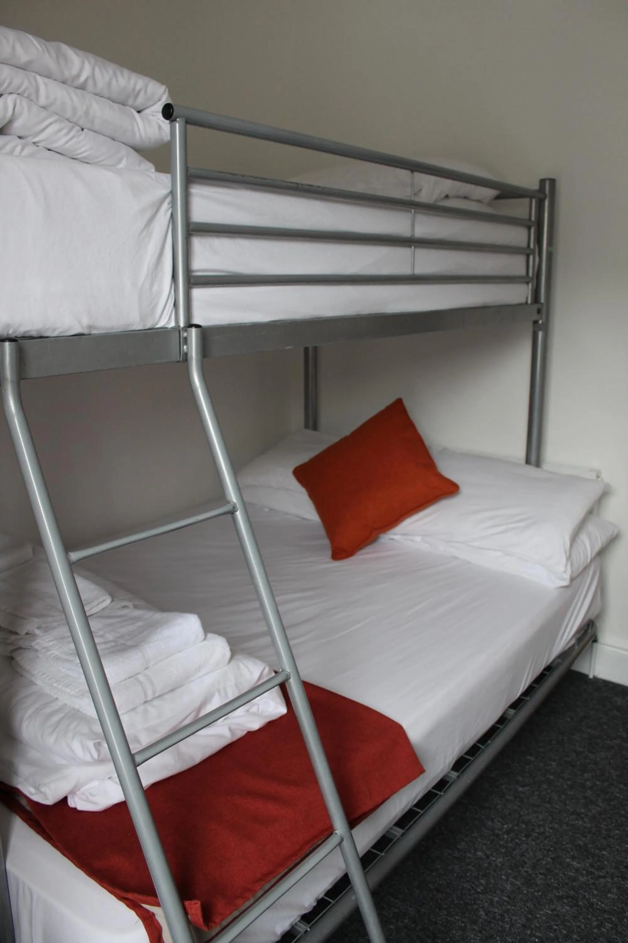 Photo of the whole room, Bed in Backpackers Blackpool Hotel & Suites