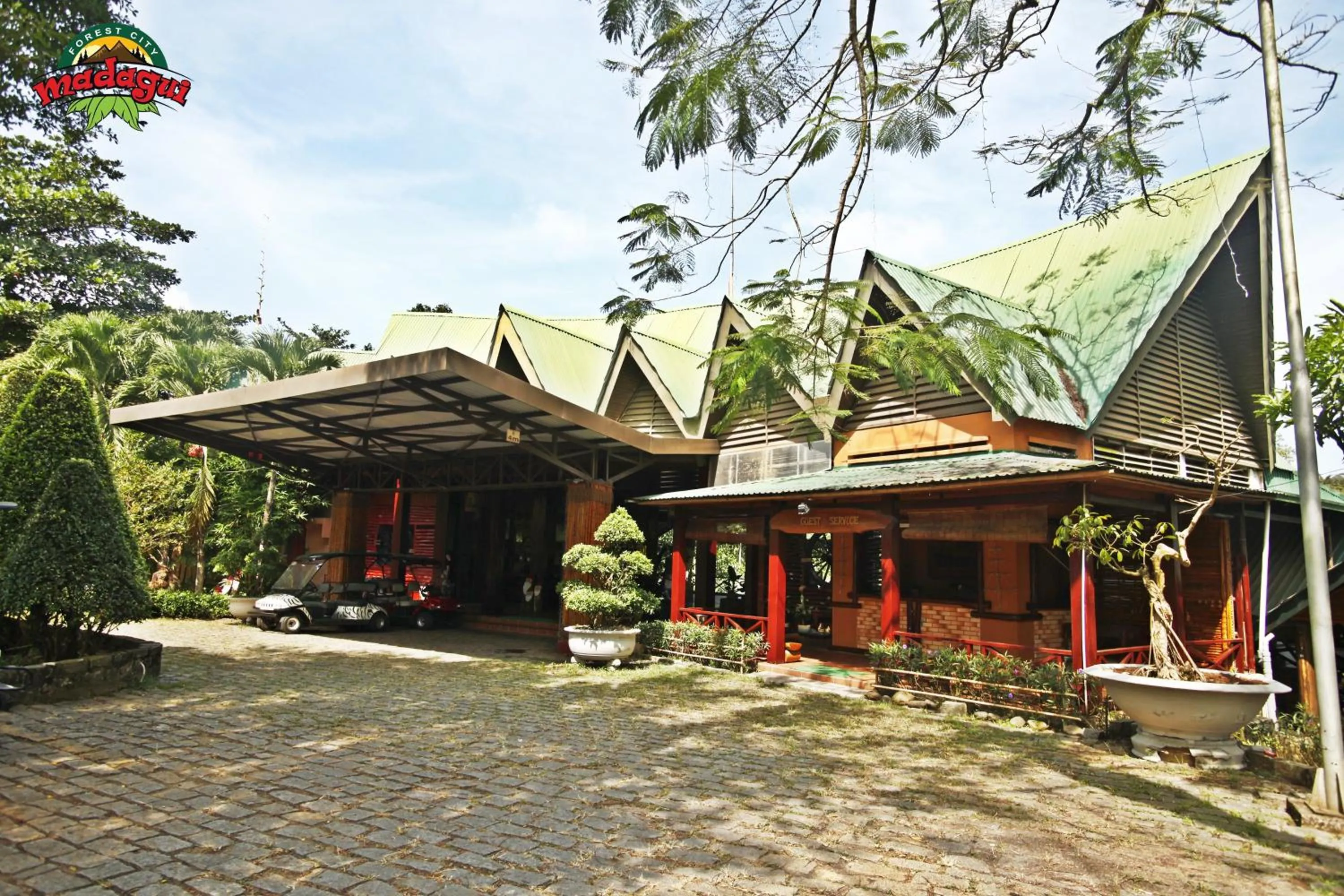 Facade/entrance in Madagui Forest City