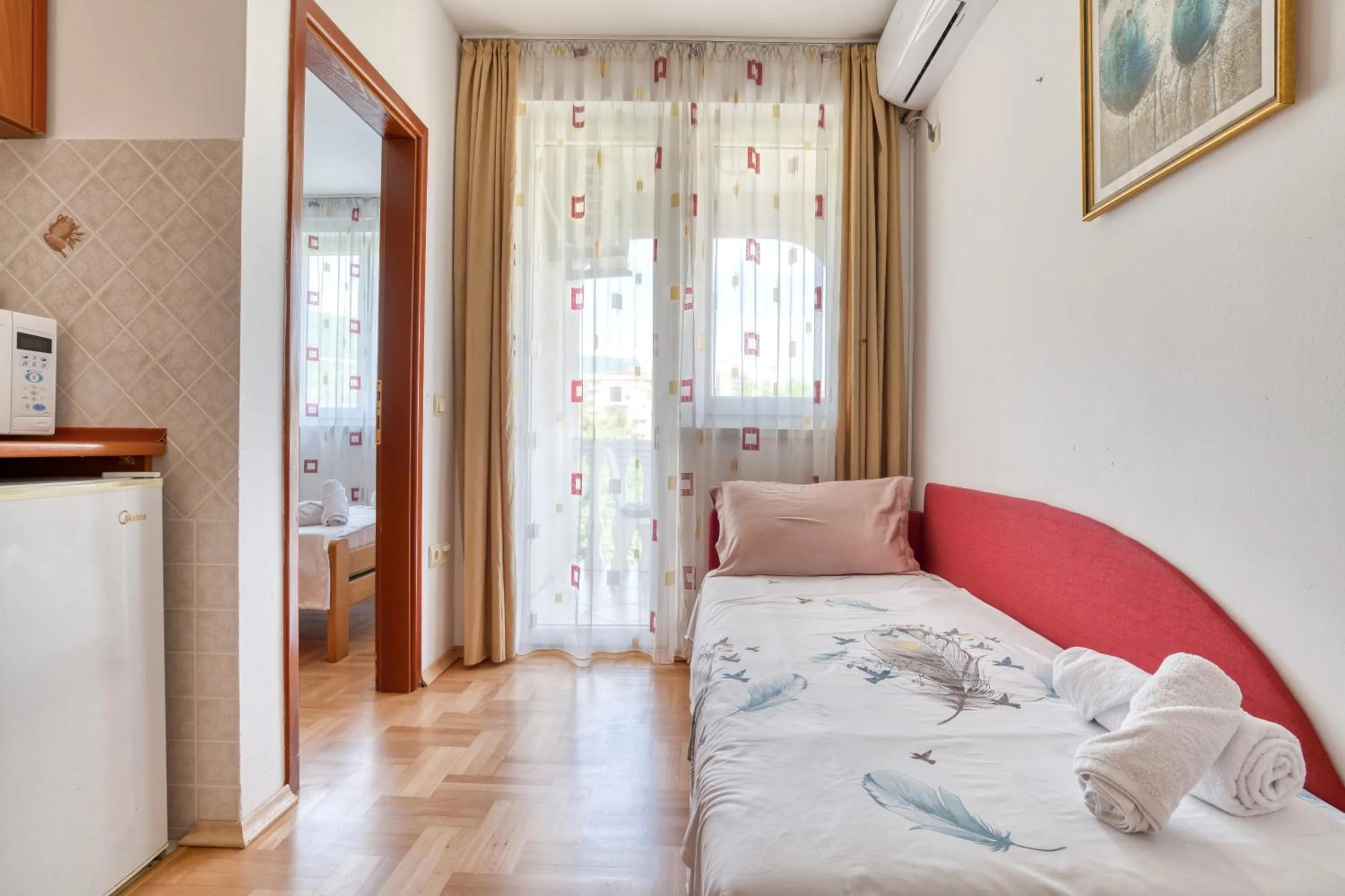 Living room, Bed in Apartments Elena