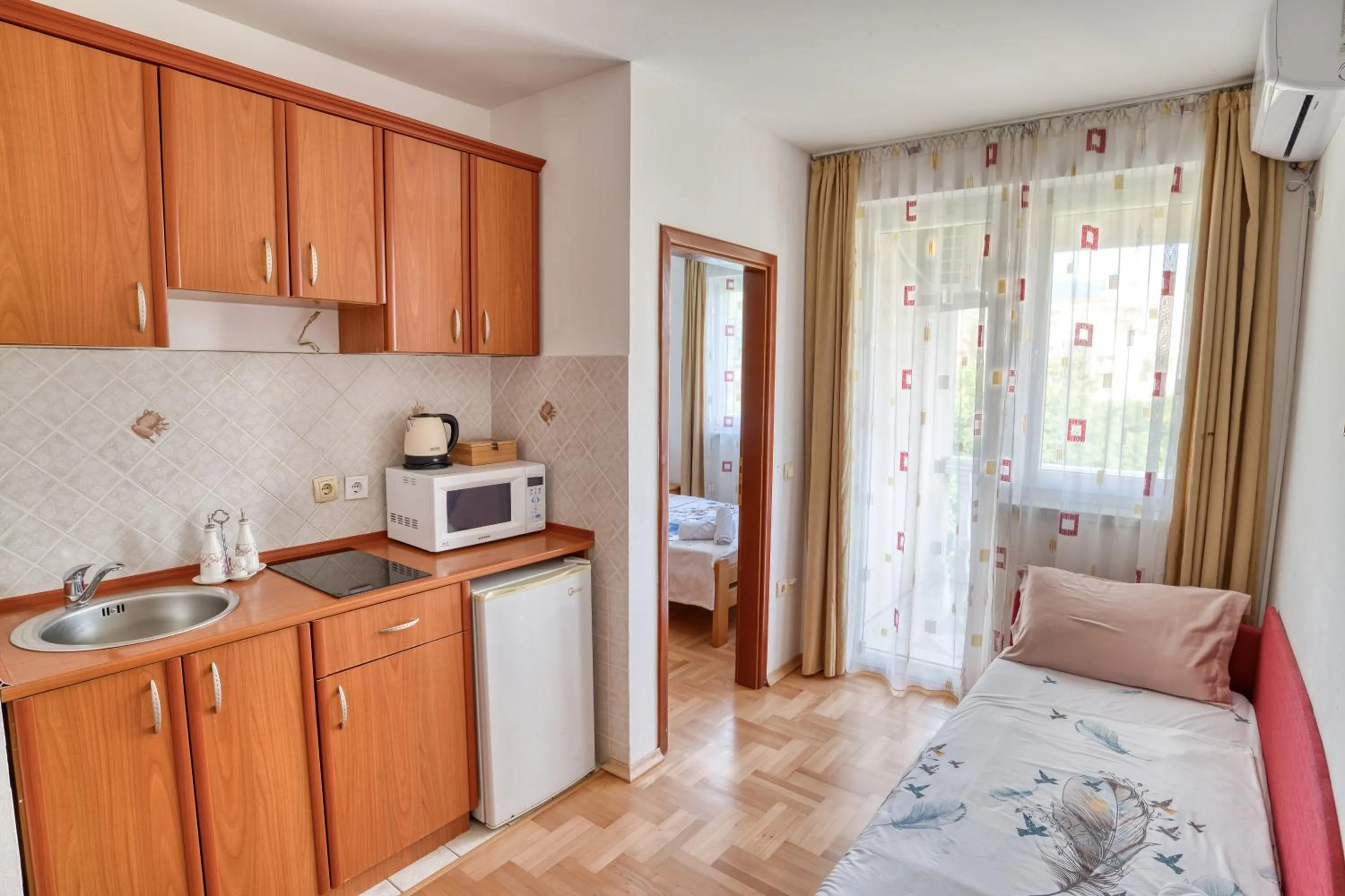 kitchen, Bed in Apartments Elena