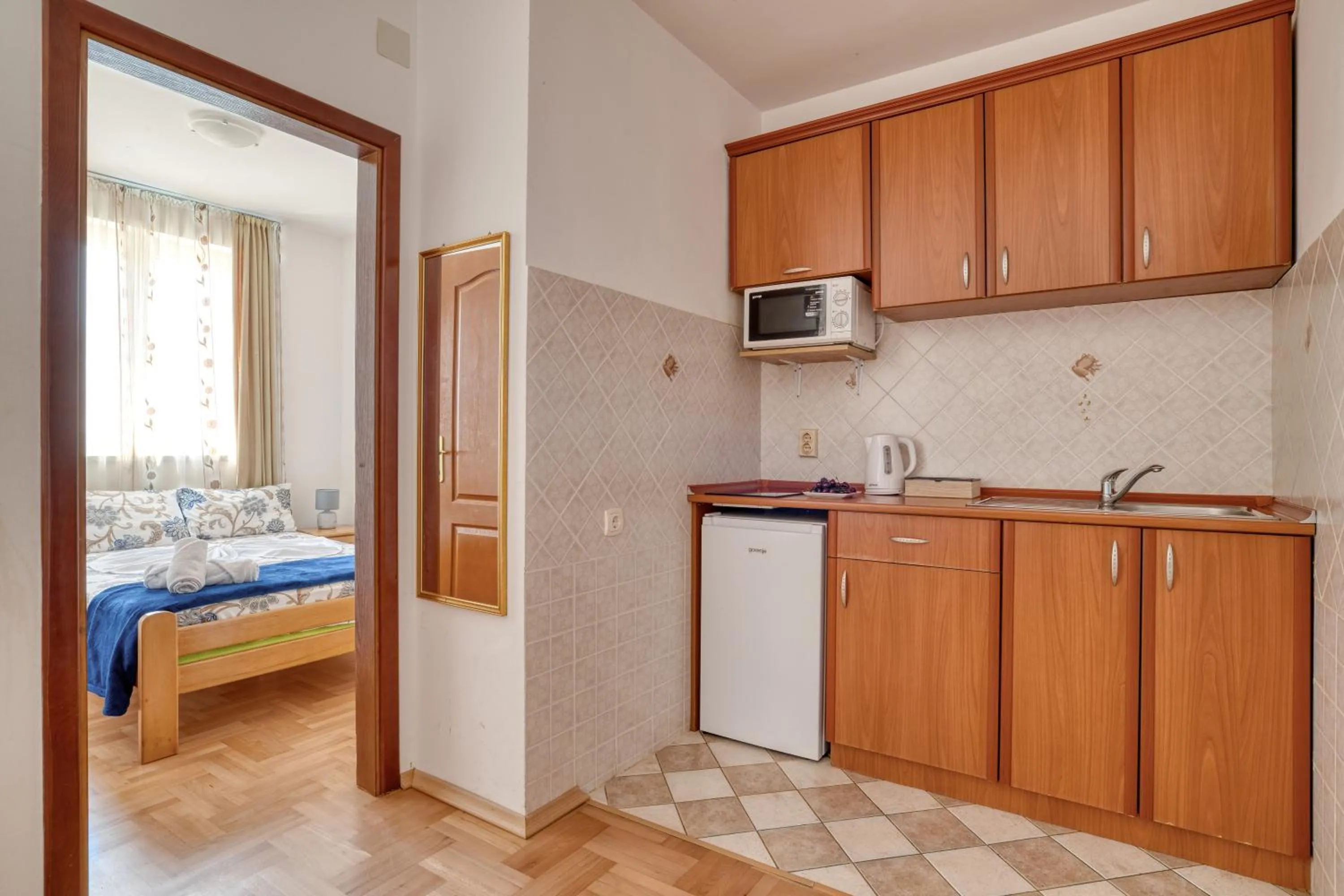 kitchen, Bed in Apartments Elena