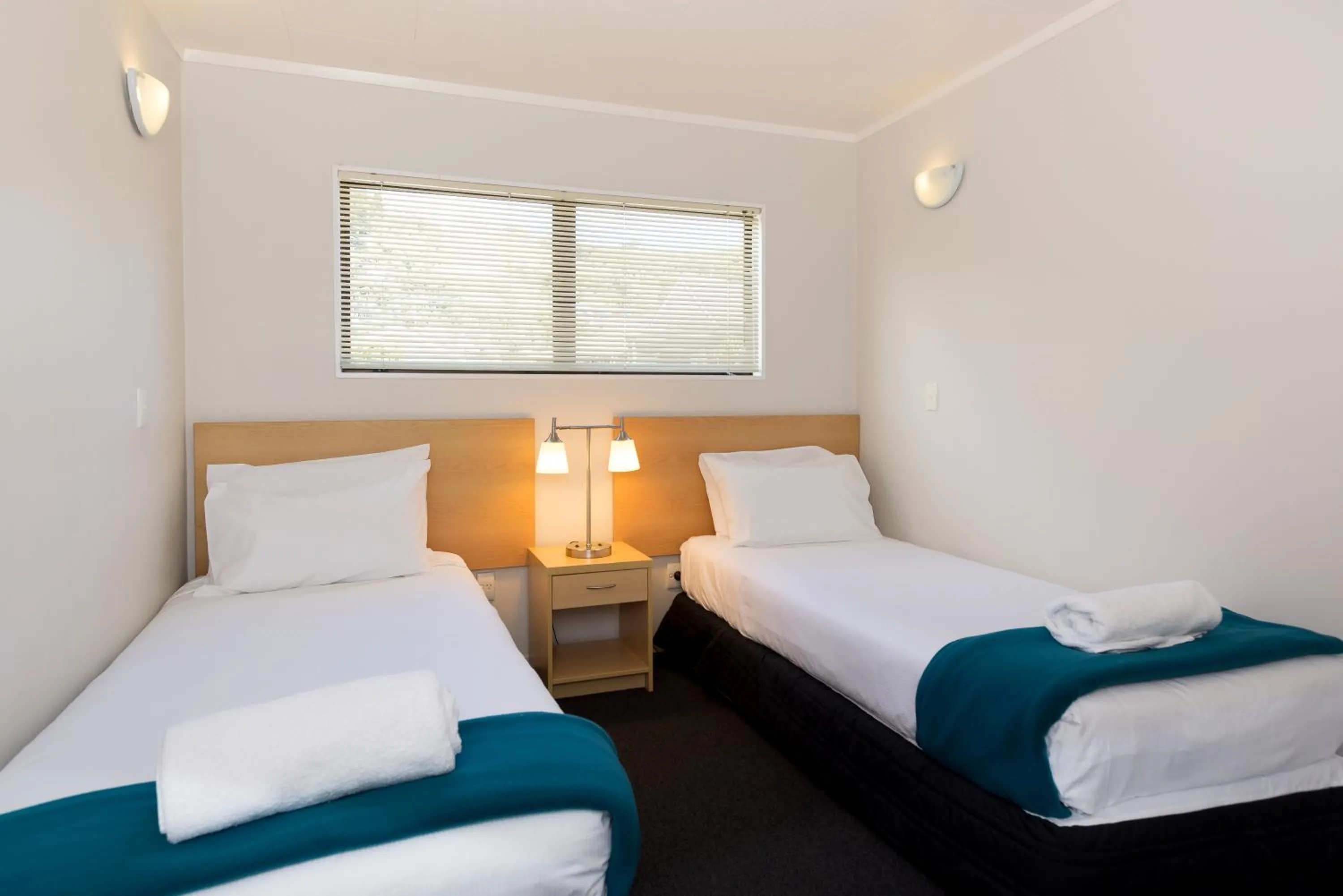 Bed in The Sands Hotel Hokianga