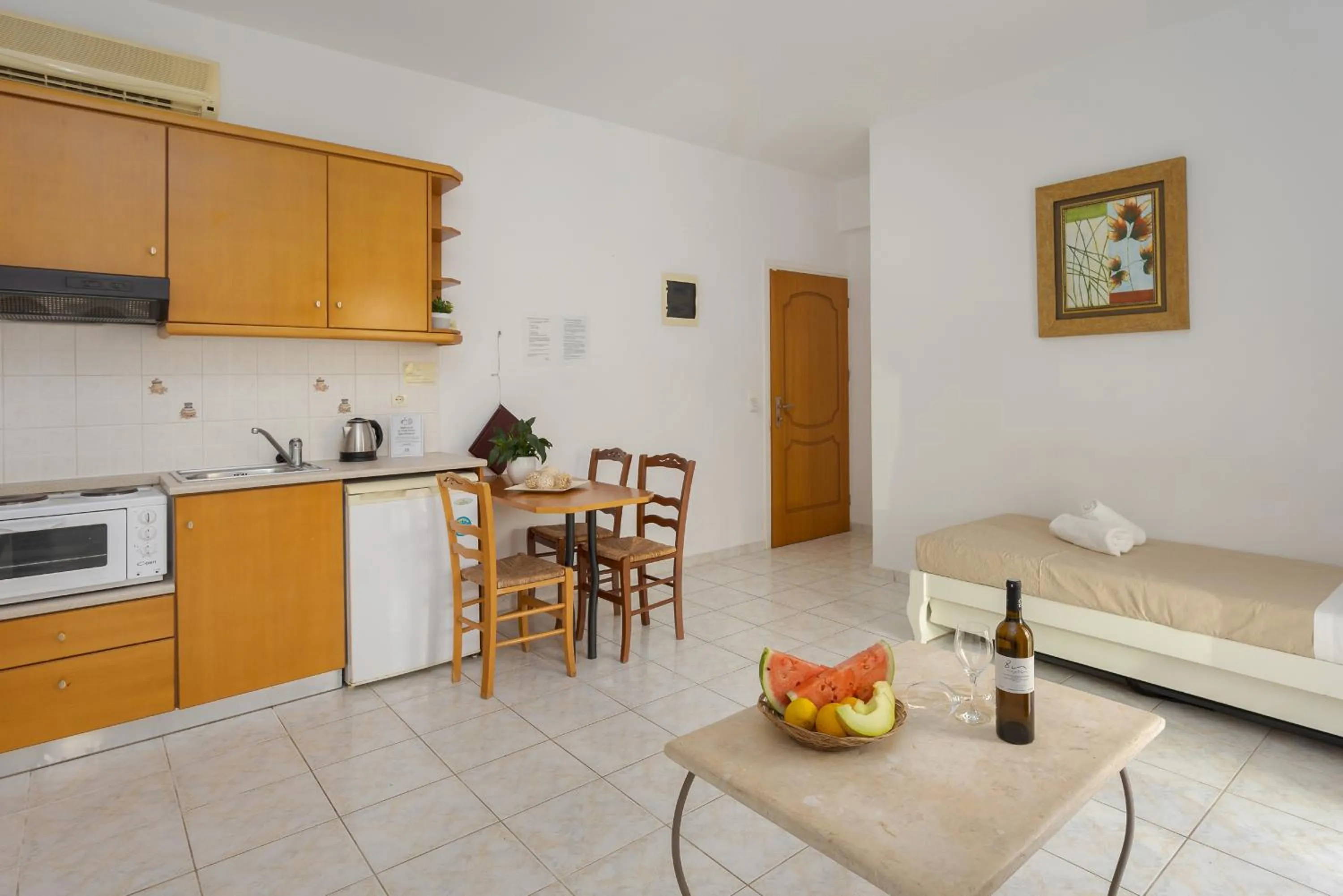 Bed in Irida Aparthotel Malia by Estia