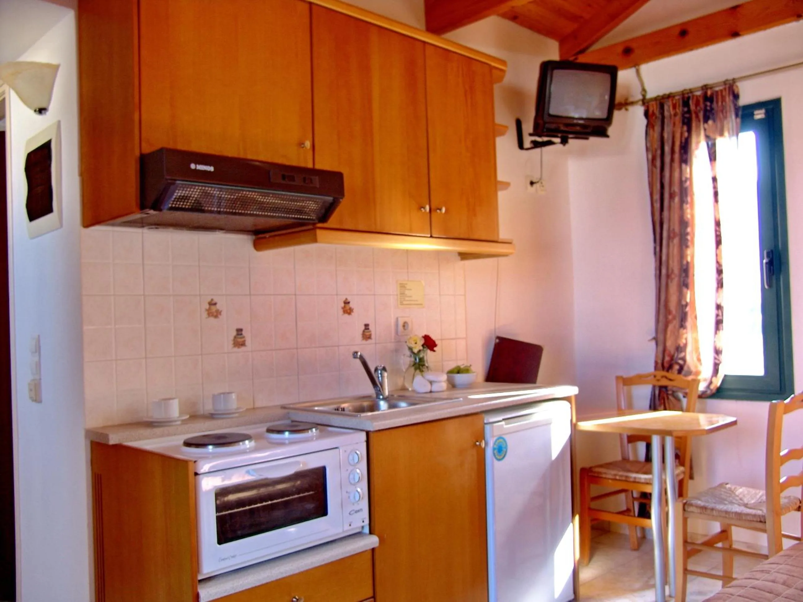 Kitchen or kitchenette in Irida Aparthotel Malia by Estia
