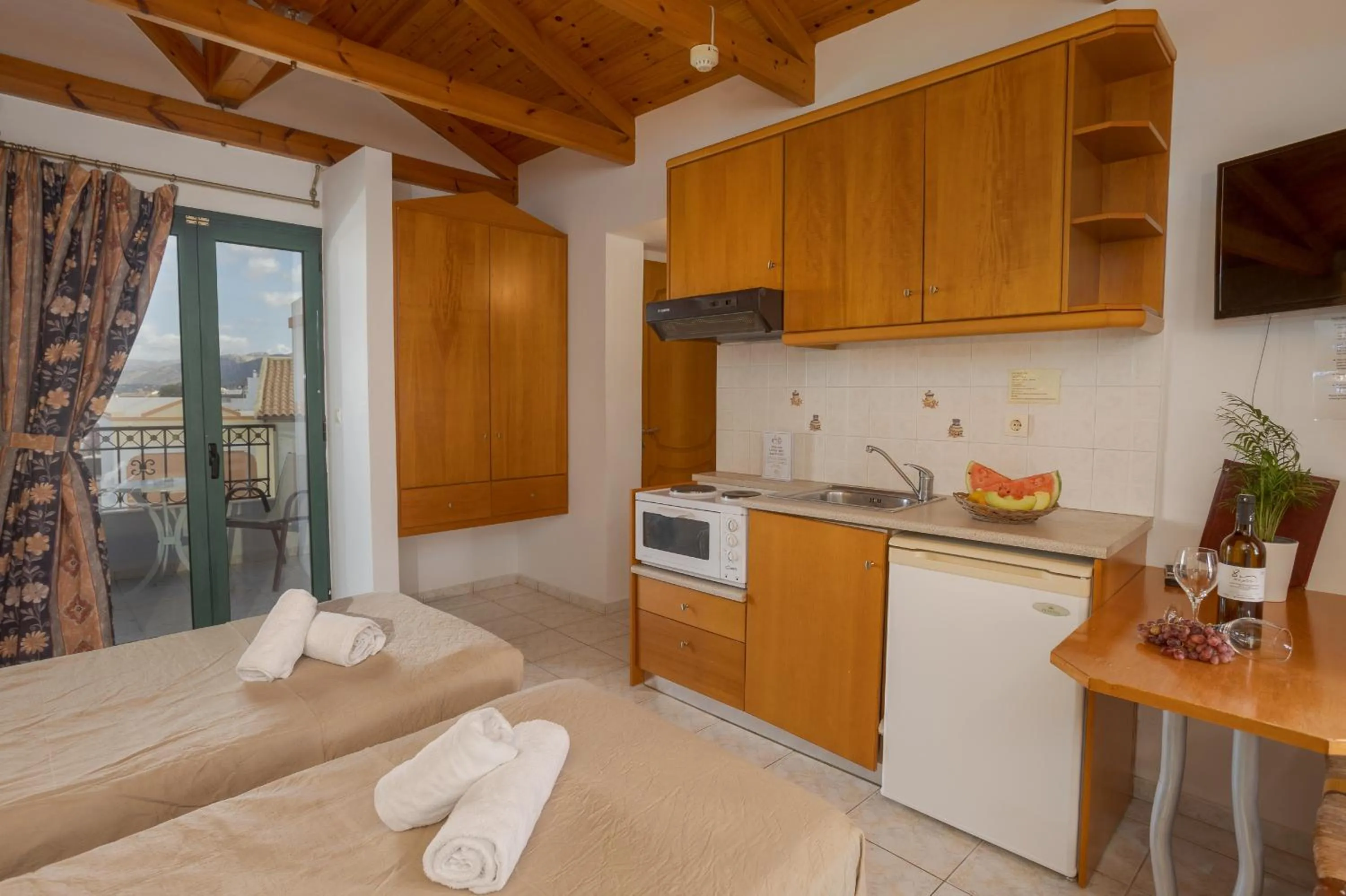 Kitchen or kitchenette in Irida Aparthotel Malia by Estia