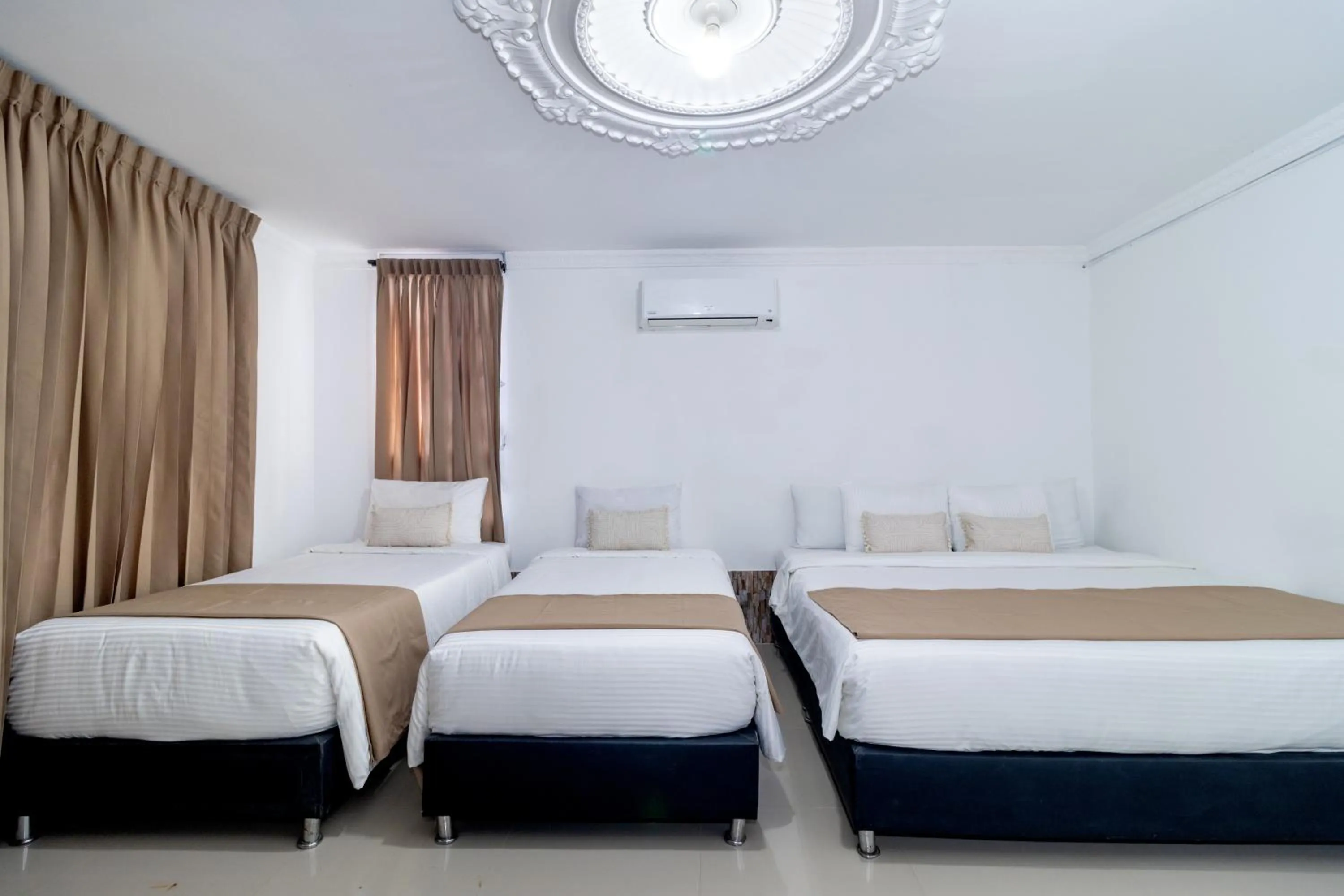 Photo of the whole room, Bed in Hotel Playa Salguero By GEH Suites